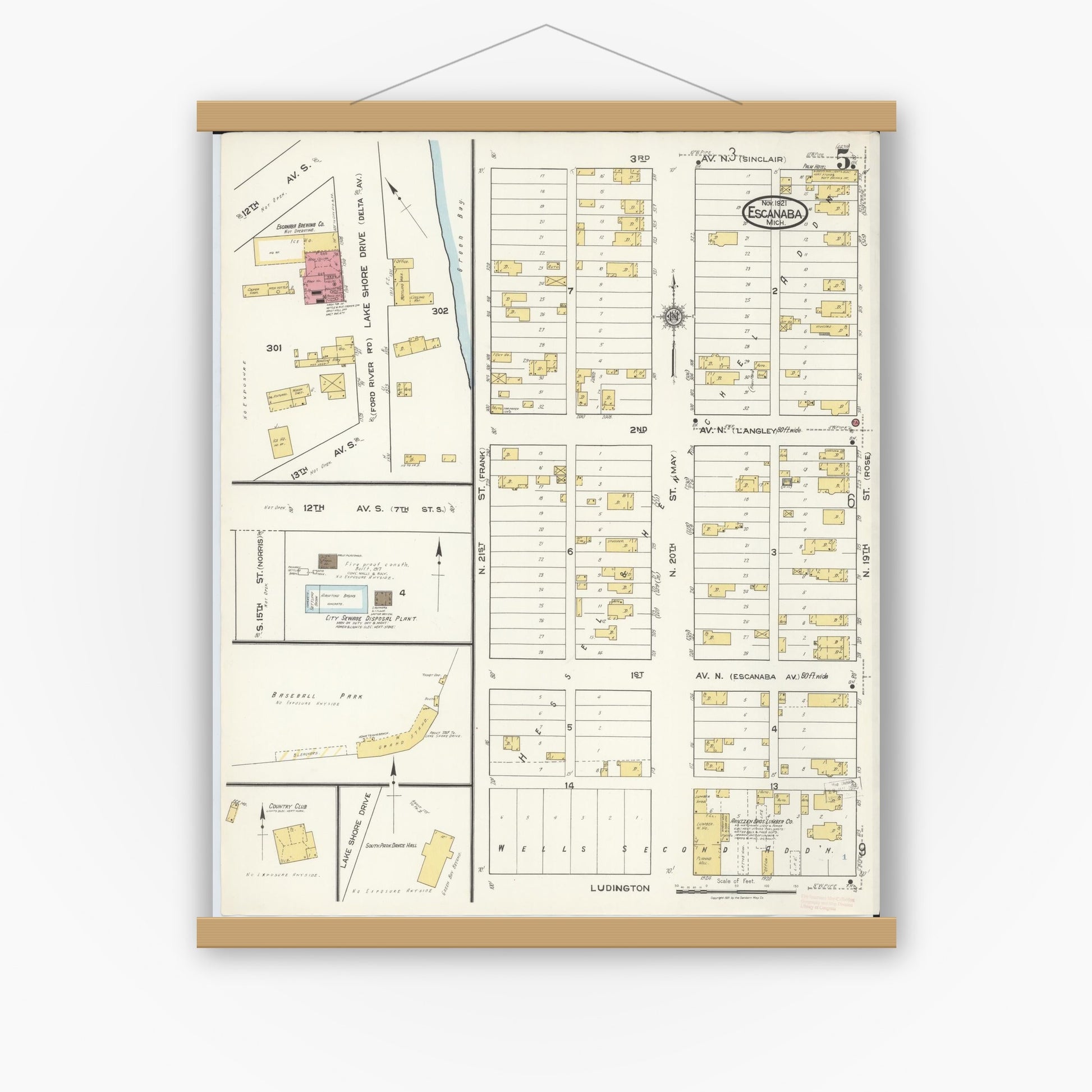 Old map wall art mockup — magnetic wood frame on white wall — Sanborn Fire Insurance Map from Escanaba, Delta County, Michigan (1921), Sheet #0005