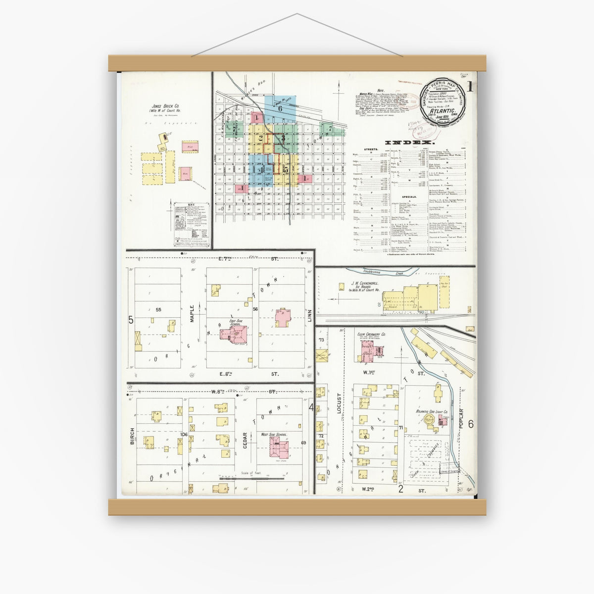 Old map wall art mockup — magnetic wood frame on white wall — Sanborn Fire Insurance Map from Atlantic, Cass County, Iowa (1899) â€” Complete Set