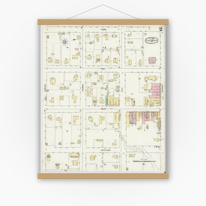 Old map wall art mockup — magnetic wood frame on white wall — Sanborn Fire Insurance Map from Caldwell, Burleson County, Texas (1896), Sheet #0002