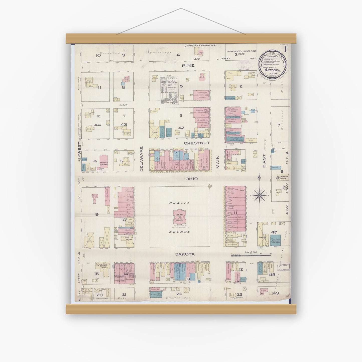 Old map wall art mockup — magnetic wood frame on white wall — Sanborn Fire Insurance Map from Butler, Bates County, Missouri (1885) - Complete Map Set