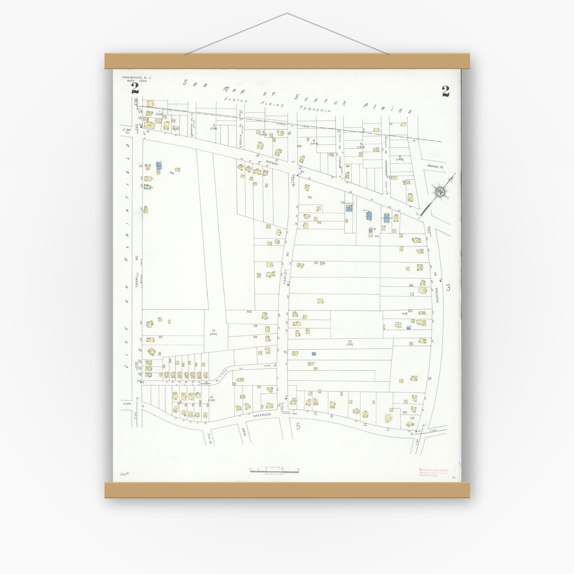Old map wall art mockup — magnetic wood frame on white wall — Sanborn Fire Insurance Map from Fanwood, Union County, New Jersey (1933), Sheet #0002