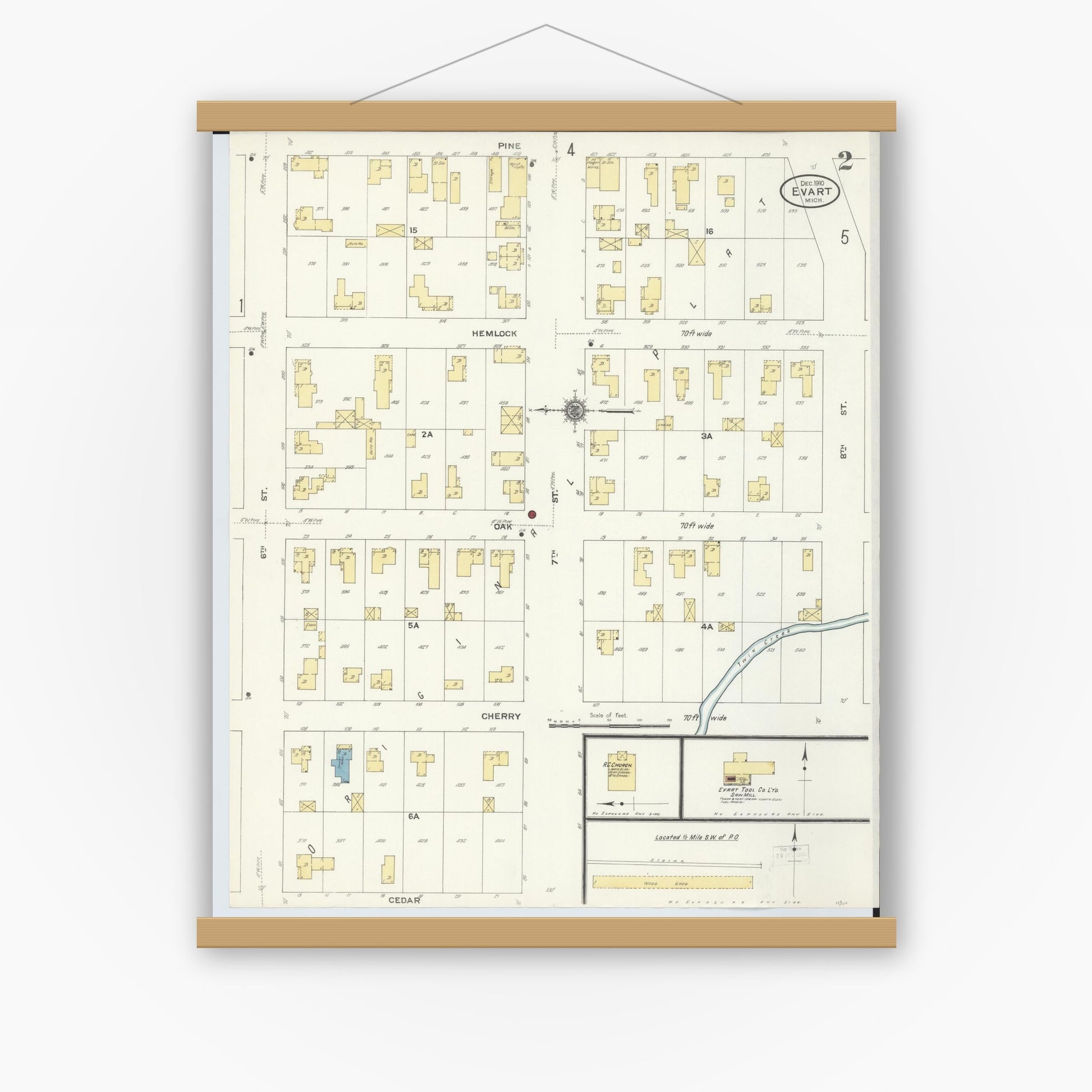 Old map wall art mockup — magnetic wood frame on white wall — Sanborn Fire Insurance Map from Evart, Osceola County, Michigan (1910), Sheet #0002