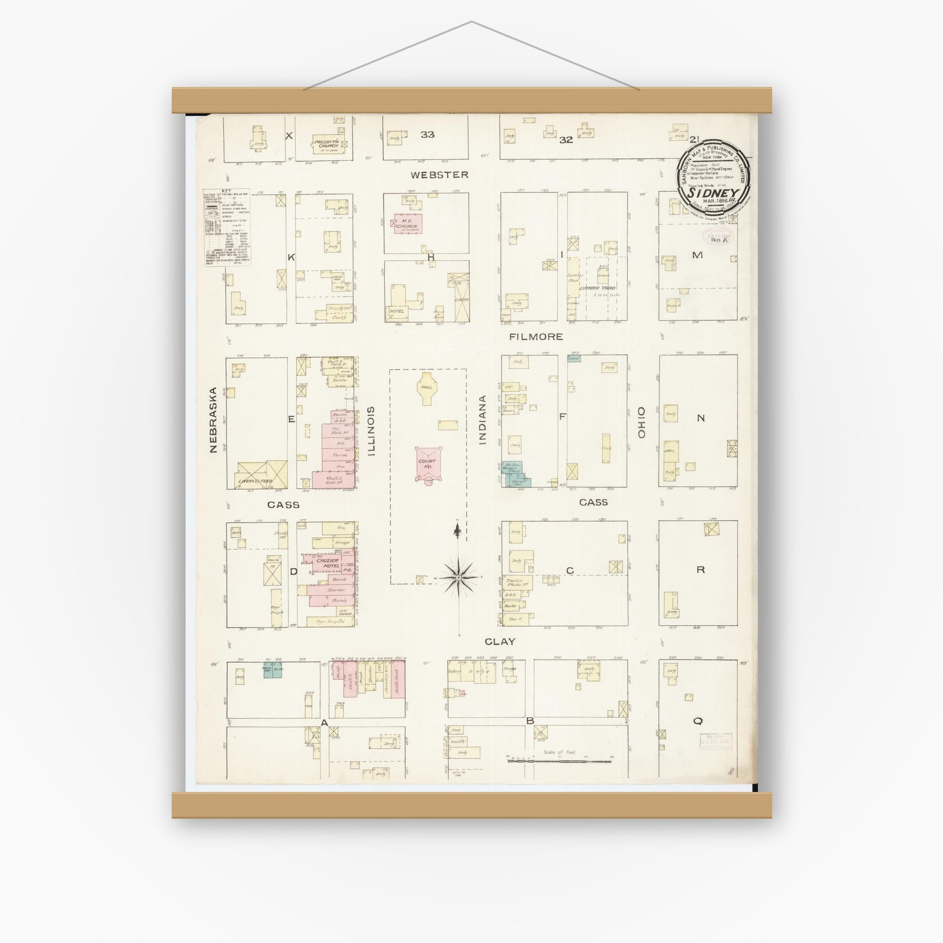 Old map wall art mockup — magnetic wood frame on white wall — Sanborn Fire Insurance Map from Sidney, Fremont County, Iowa (1886), Sheet #0001