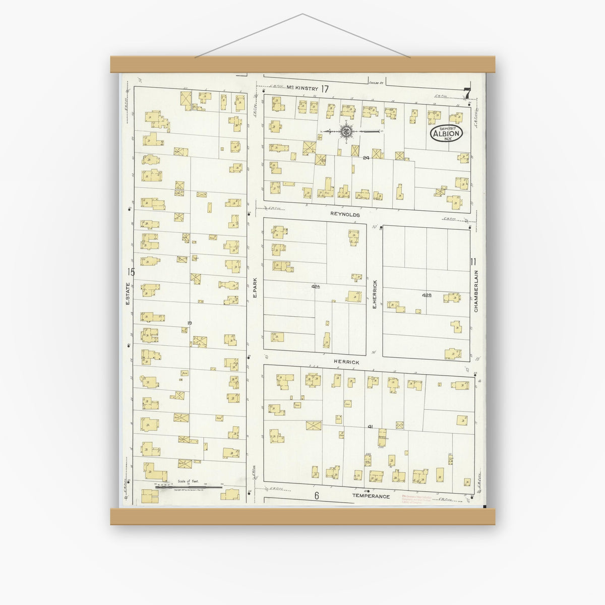 Old map wall art mockup — magnetic wood frame on white wall — Sanborn Fire Insurance Map from Albion, Orleans County, New York (1917), Sheet #0007