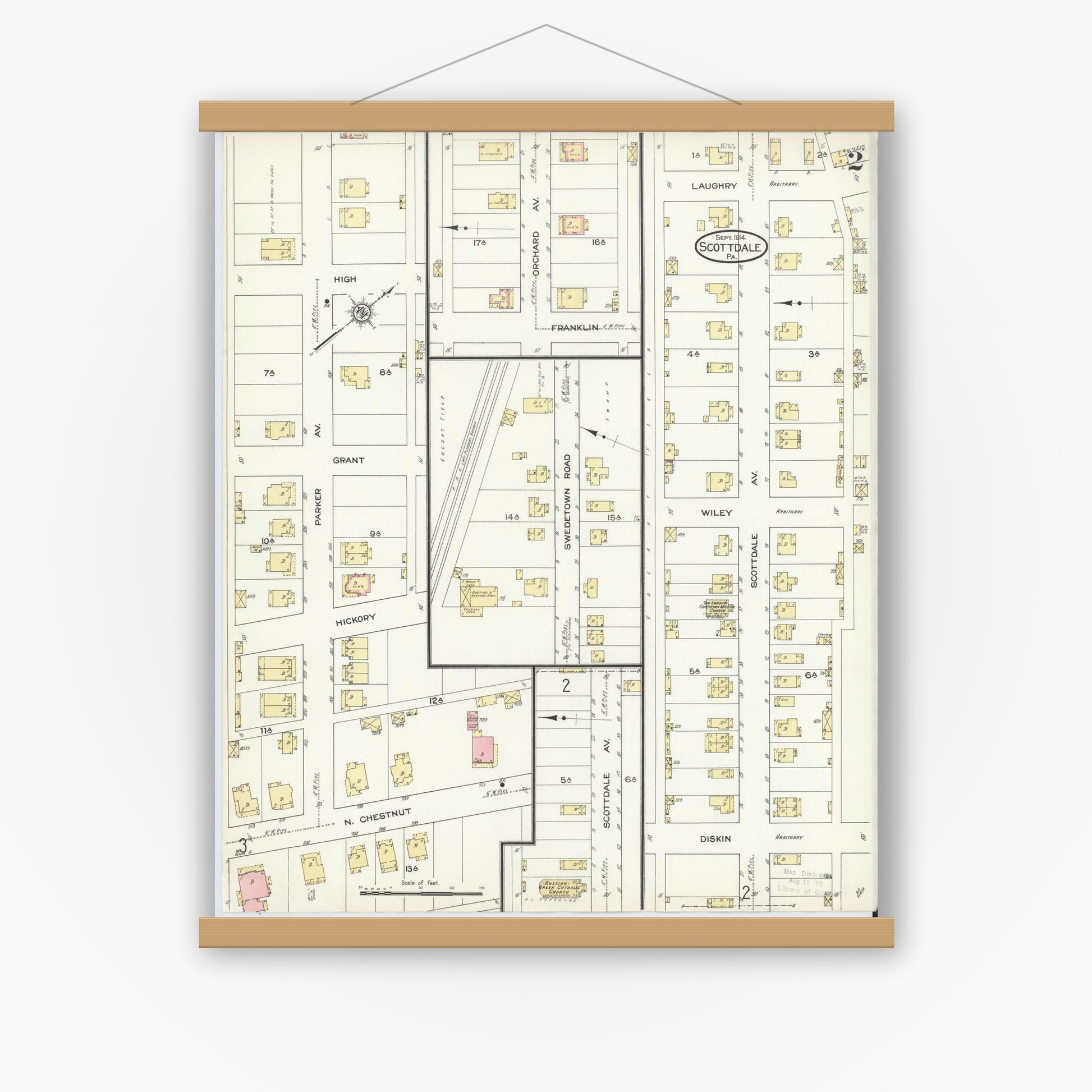 Old map wall art mockup — magnetic wood frame on white wall — Sanborn Fire Insurance Map from Scottdale, Westmoreland County, Pennsylvania (1914), Sheet #0002
