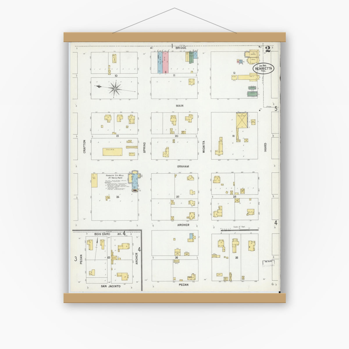 Old map wall art mockup — magnetic wood frame on white wall — Sanborn Fire Insurance Map from Henrietta, Clay County, Texas (1902), Sheet #0002