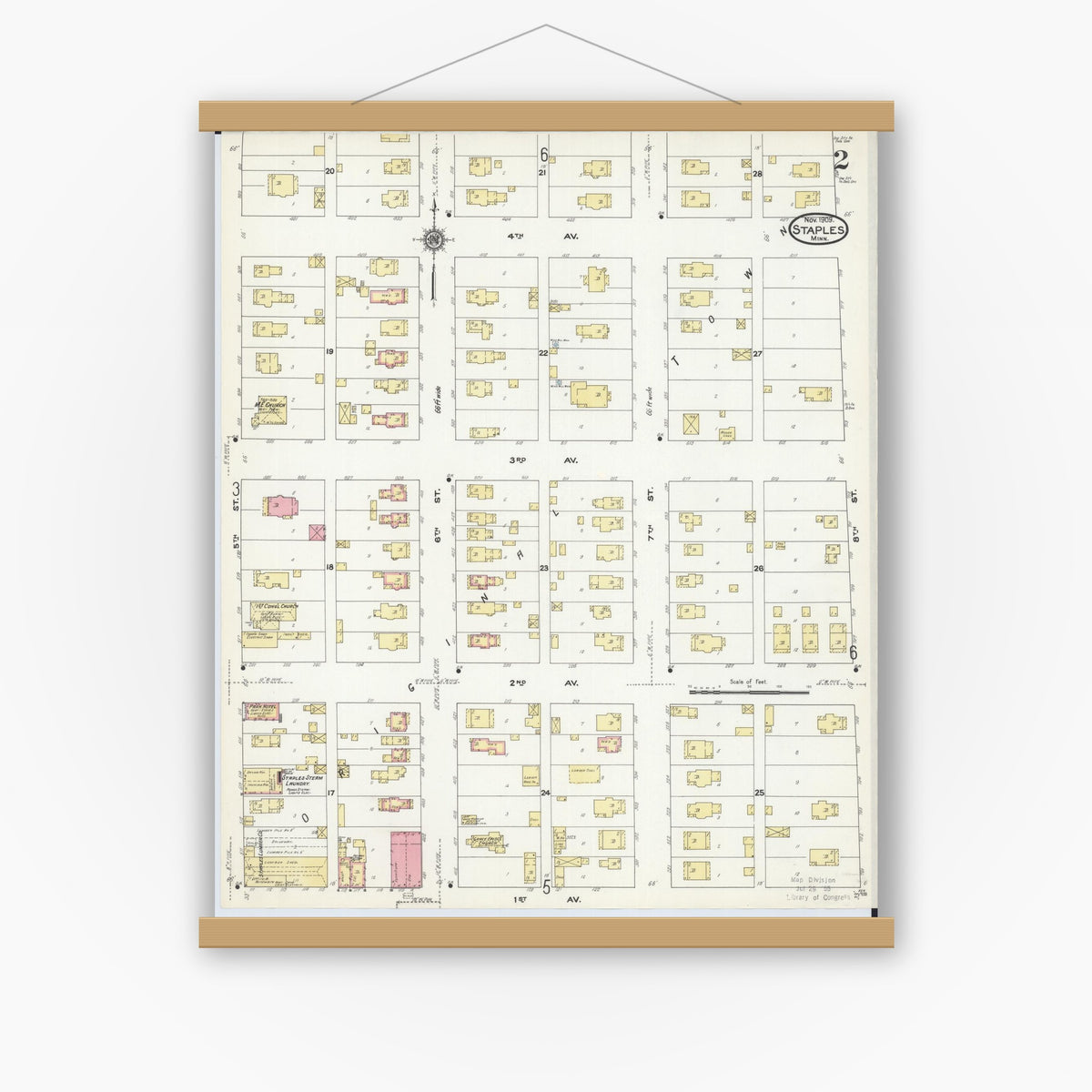 Old map wall art mockup — magnetic wood frame on white wall — Sanborn Fire Insurance Map from Staples, Todd County, Minnesota (1909), Sheet #0002