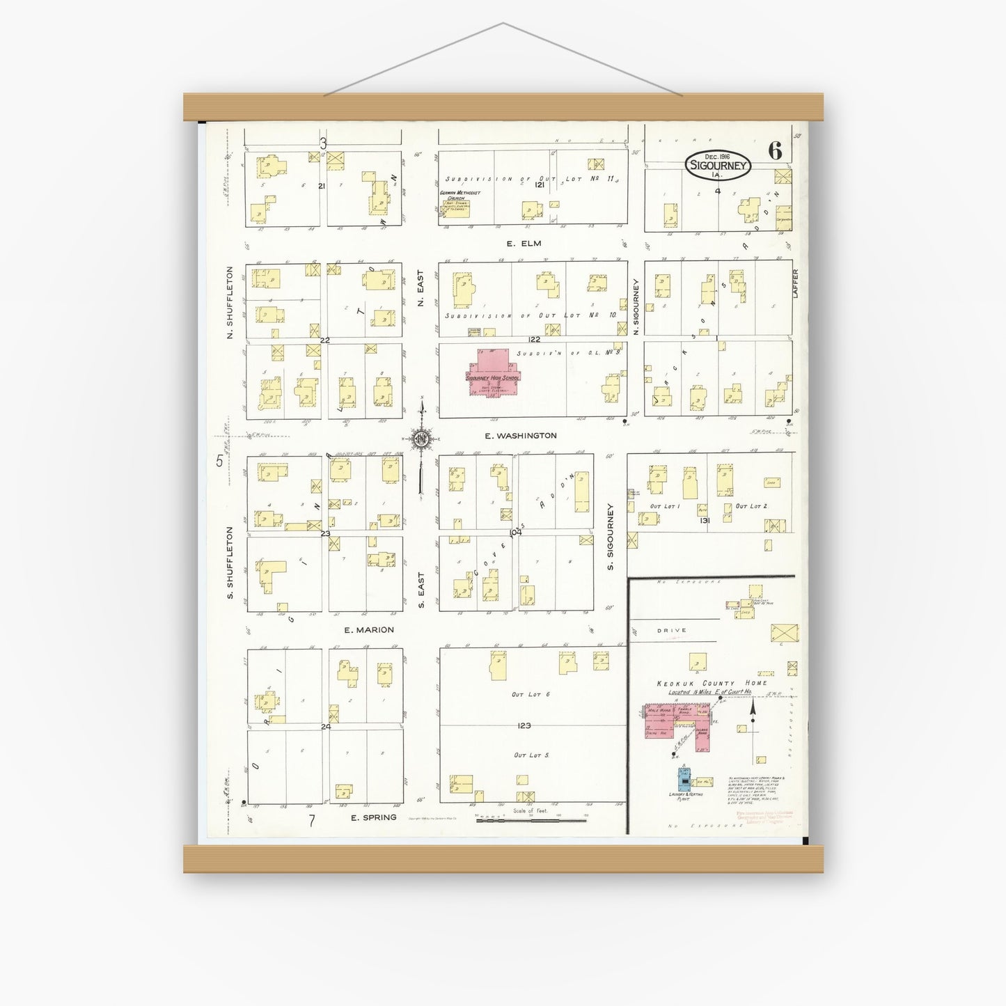 Old map wall art mockup — magnetic wood frame on white wall — Sanborn Fire Insurance Map from Sigourney, Kiokuk County, Iowa (1916), Sheet #0006
