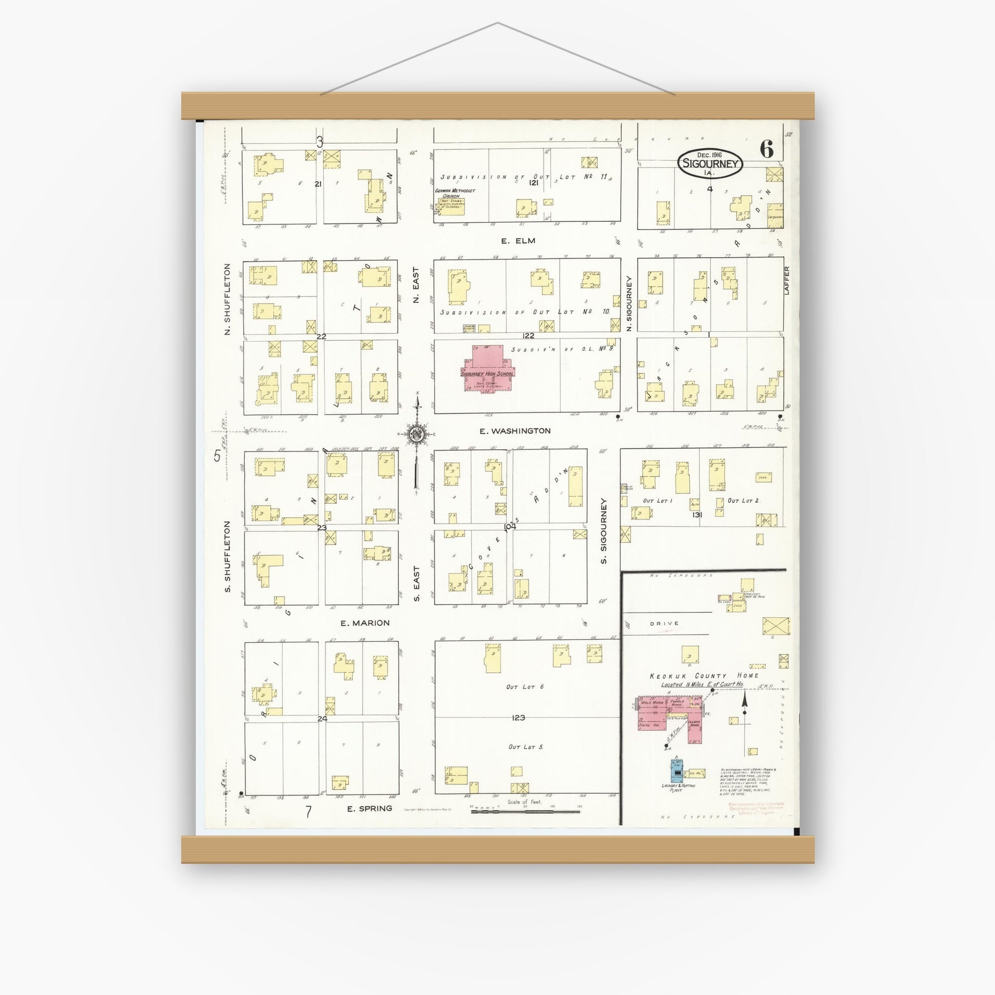 Old map wall art mockup — magnetic wood frame on white wall — Sanborn Fire Insurance Map from Sigourney, Kiokuk County, Iowa (1916), Sheet #0006