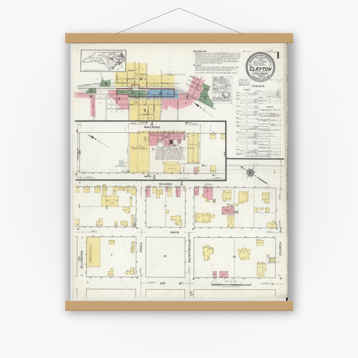Old map wall art mockup — magnetic wood frame on white wall — Sanborn Fire Insurance Map from Clayton, Johnston County, North Carolina (1918) - Complete Map Set