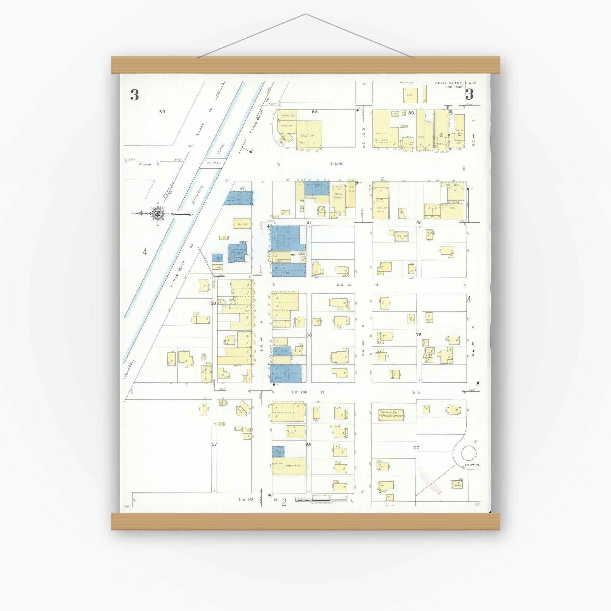Old map wall art mockup — magnetic wood frame on white wall — Sanborn Fire Insurance Map from Belle Glade, Palm Beach County, Florida (1942), Sheet #0003