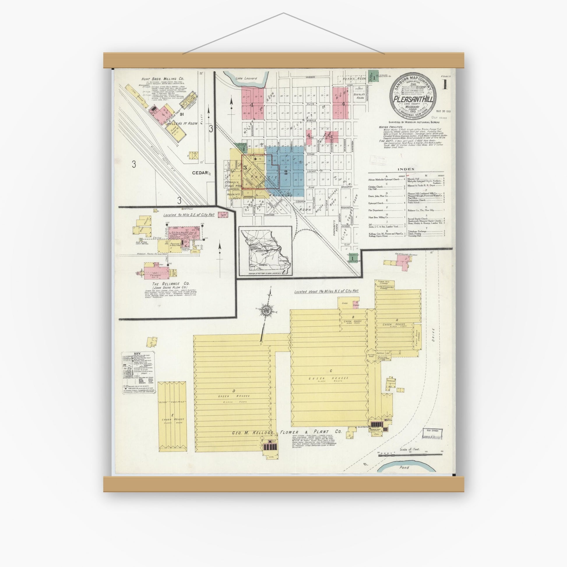 Old map wall art mockup — magnetic wood frame on white wall — Sanborn Fire Insurance Map from Pleasant Hill, Cass County, Missouri (1913) - Complete Map Set