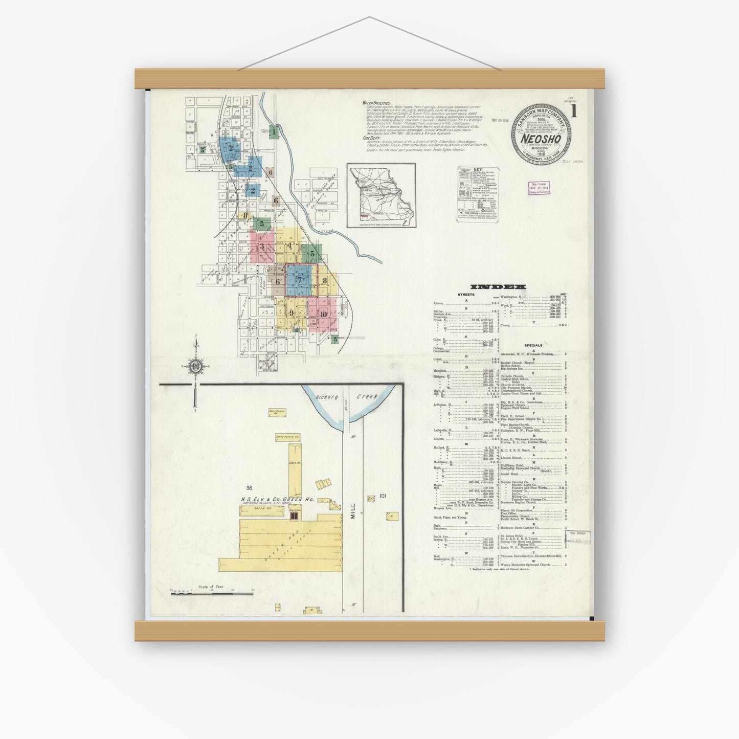Old map wall art mockup — magnetic wood frame on white wall — Sanborn Fire Insurance Map from Neosho, Newton County, Missouri (1916) - Complete Map Set