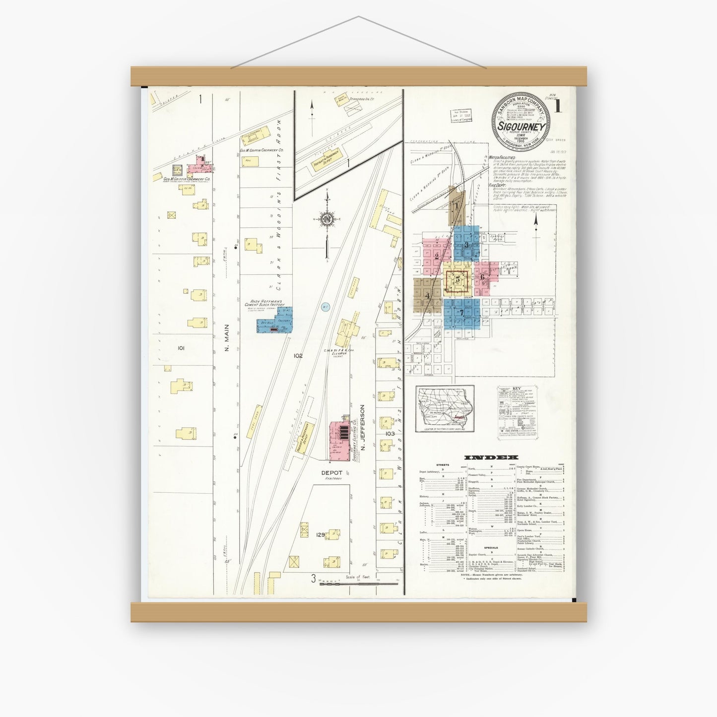 Old map wall art mockup — magnetic wood frame on white wall — Sanborn Fire Insurance Map from Sigourney, Kiokuk County, Iowa (1916), Sheet #0001
