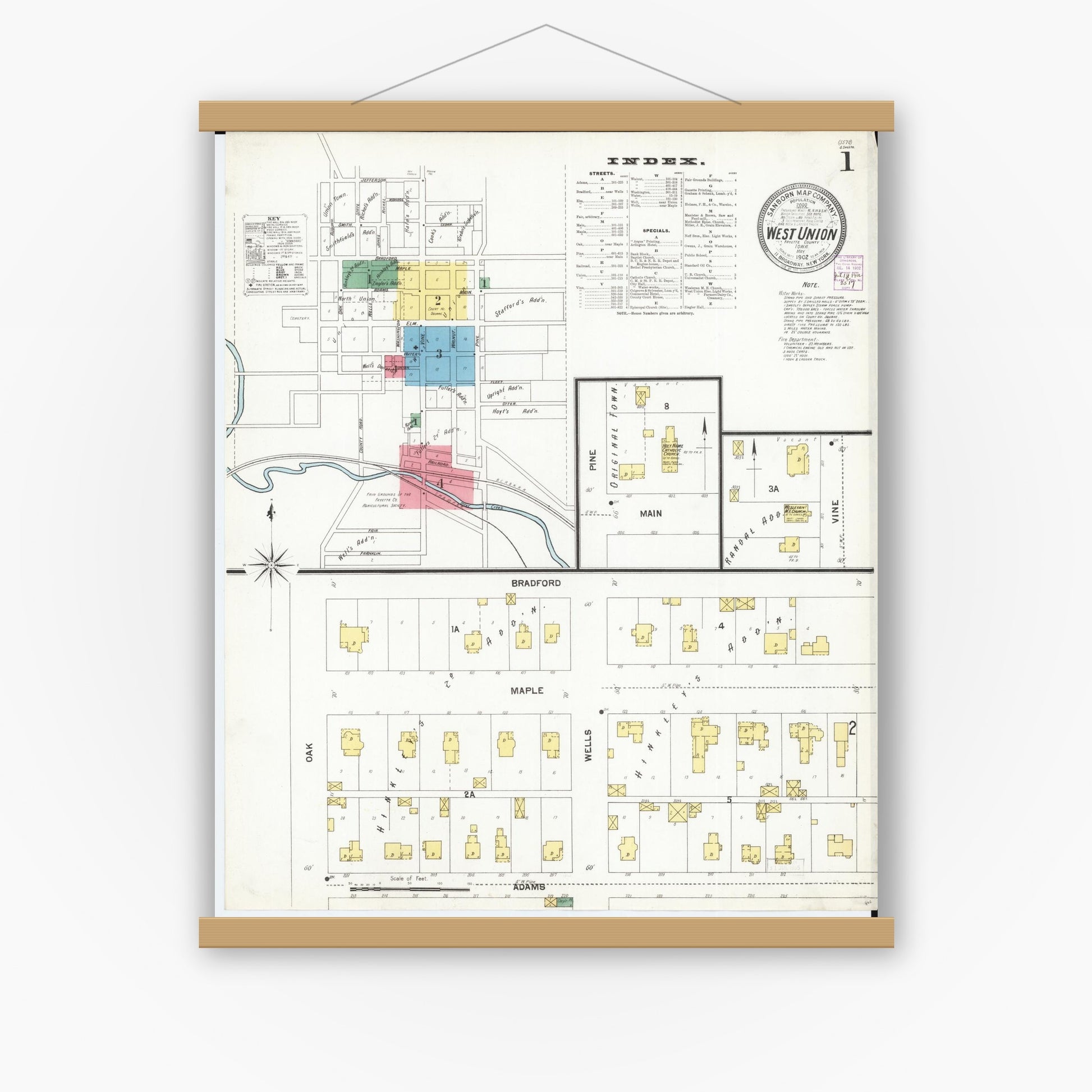 Old map wall art mockup — magnetic wood frame on white wall — Sanborn Fire Insurance Map from West Union, Fayette County, Iowa (1902), Sheet #0001