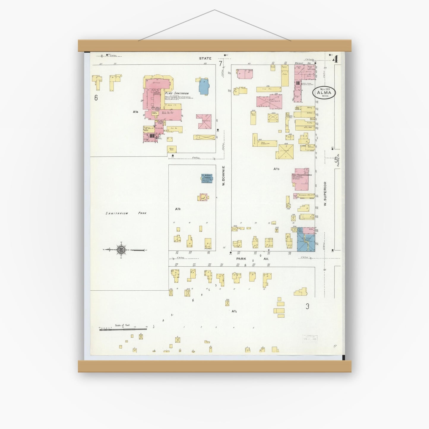 Old map wall art mockup — magnetic wood frame on white wall — Sanborn Fire Insurance Map from Alma, Gratiot County, Michigan (1910), Sheet #0004