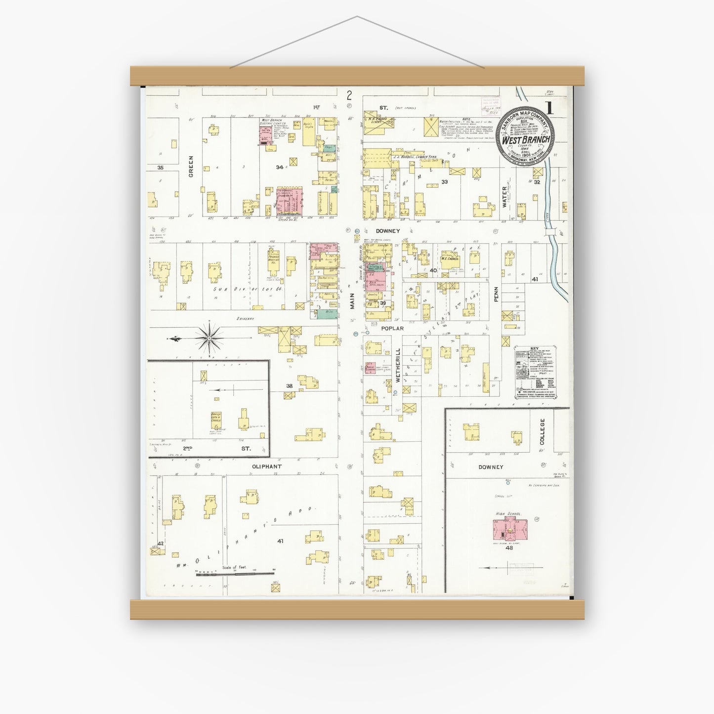 Old map wall art mockup — magnetic wood frame on white wall — Sanborn Fire Insurance Map from West Branch, Cedar County, Iowa (1906) â€” Complete Set