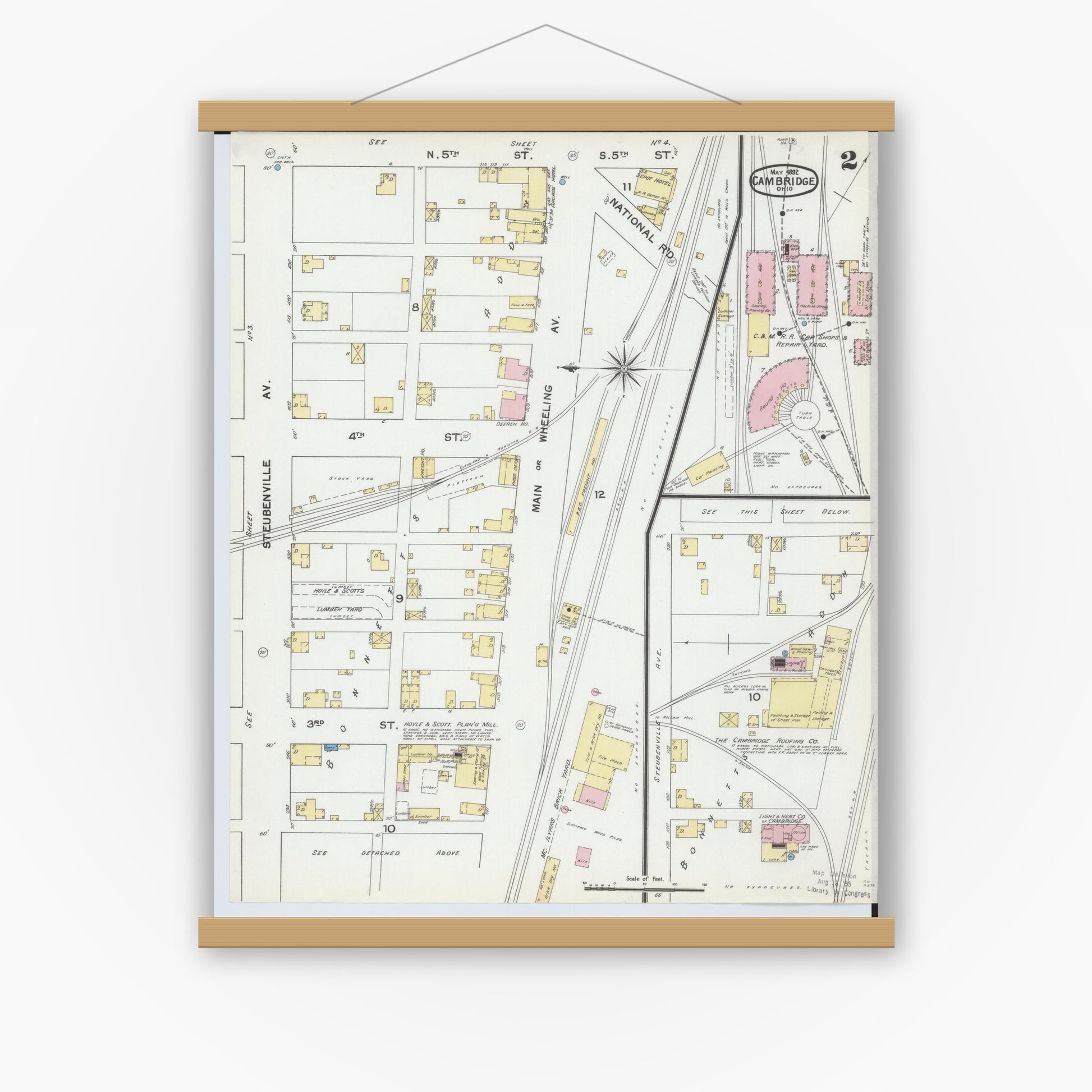 Old map wall art mockup — magnetic wood frame on white wall — Sanborn Fire Insurance Map from Cambridge, Guernsey County, Ohio (1892), Sheet #0002