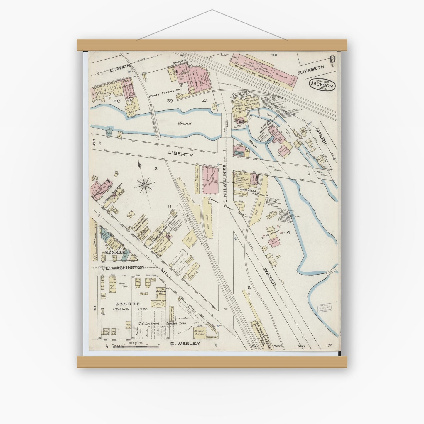Old map wall art mockup — magnetic wood frame on white wall — Sanborn Fire Insurance Map from Jackson, Jackson County, Michigan (1886), Sheet #0009