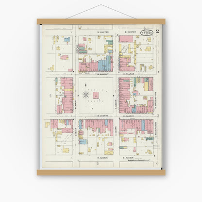 Old map wall art mockup — magnetic wood frame on white wall — Sanborn Fire Insurance Map from Nevada, Vernon County, Missouri (1894), Sheet #0002