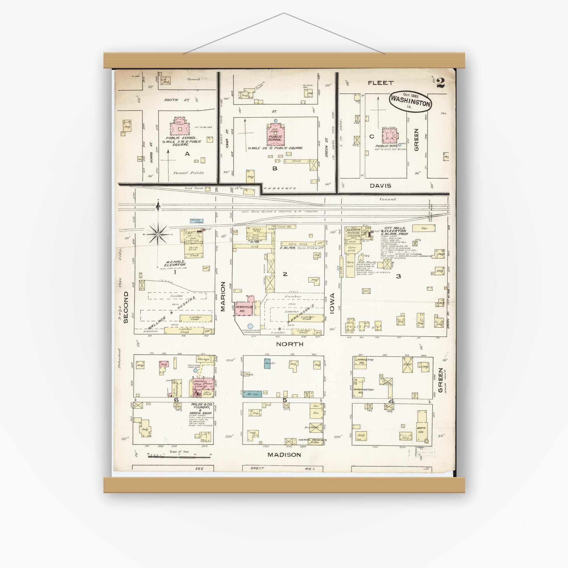 Old map wall art mockup — magnetic wood frame on white wall — Sanborn Fire Insurance Map from Washington, Washington County, Iowa (1885), Sheet #0002