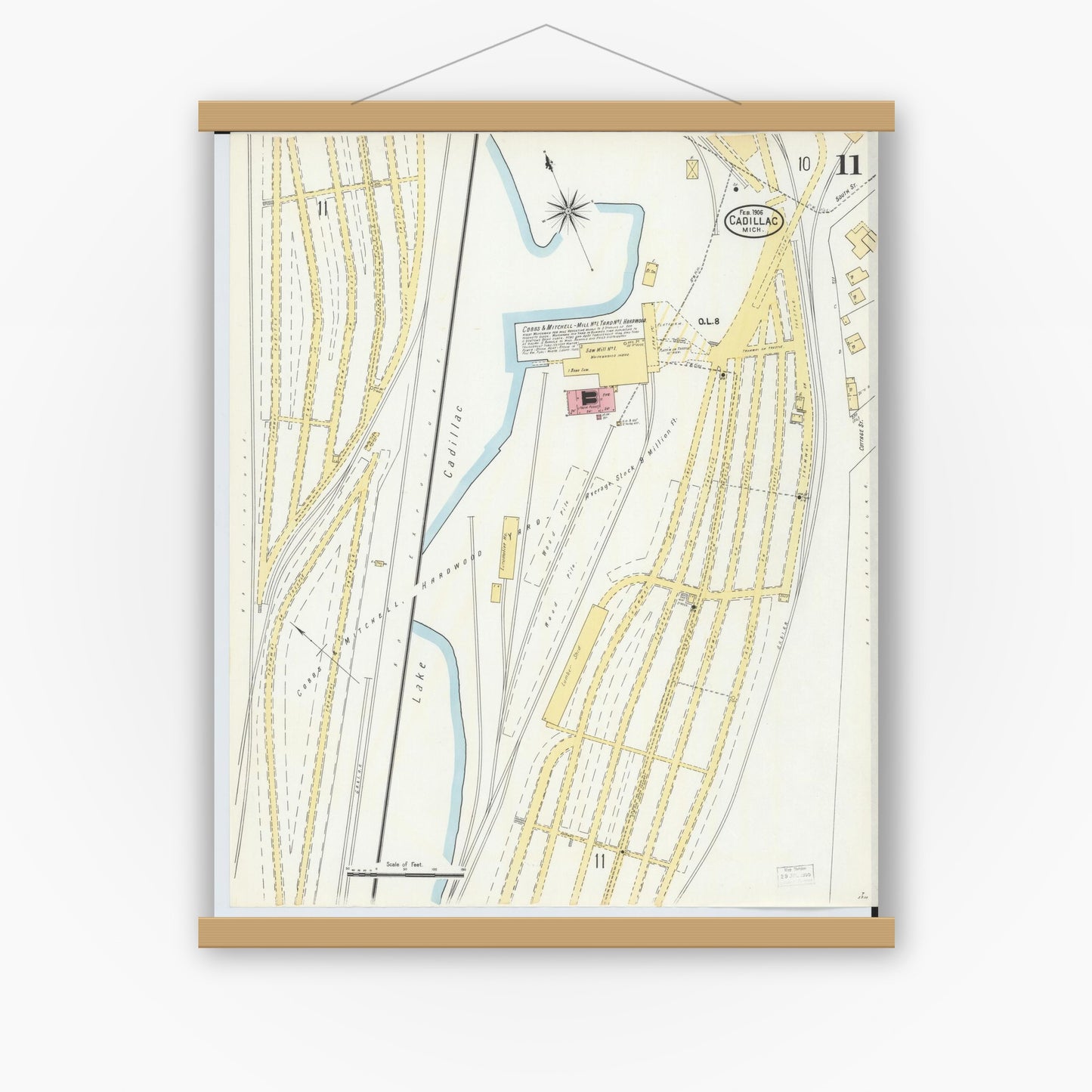 Old map wall art mockup — magnetic wood frame on white wall — Sanborn Fire Insurance Map from Cadillac, Wexford County, Michigan (1906), Sheet #0011