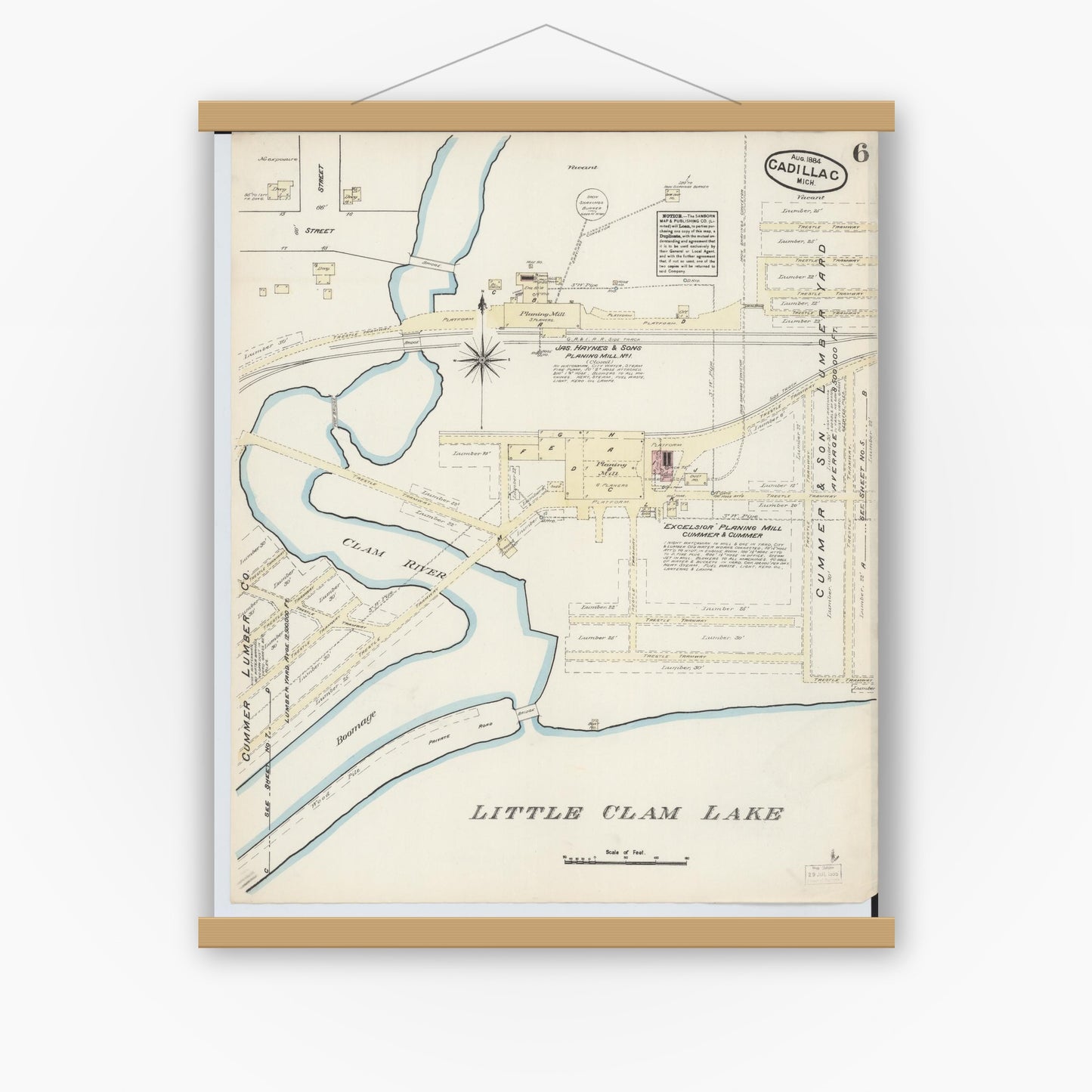 Old map wall art mockup — magnetic wood frame on white wall — Sanborn Fire Insurance Map from Cadillac, Wexford County, Michigan (1884), Sheet #0006