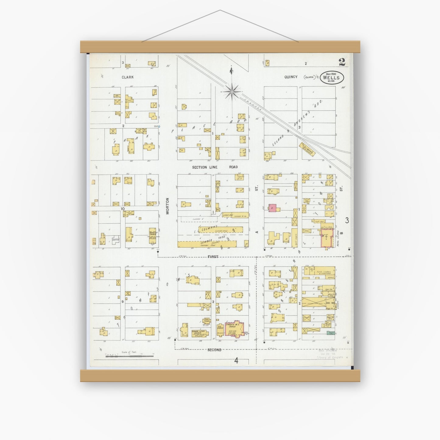 Old map wall art mockup — magnetic wood frame on white wall — Sanborn Fire Insurance Map from Wells, Faribault County, Minnesota (1900), Sheet #0002