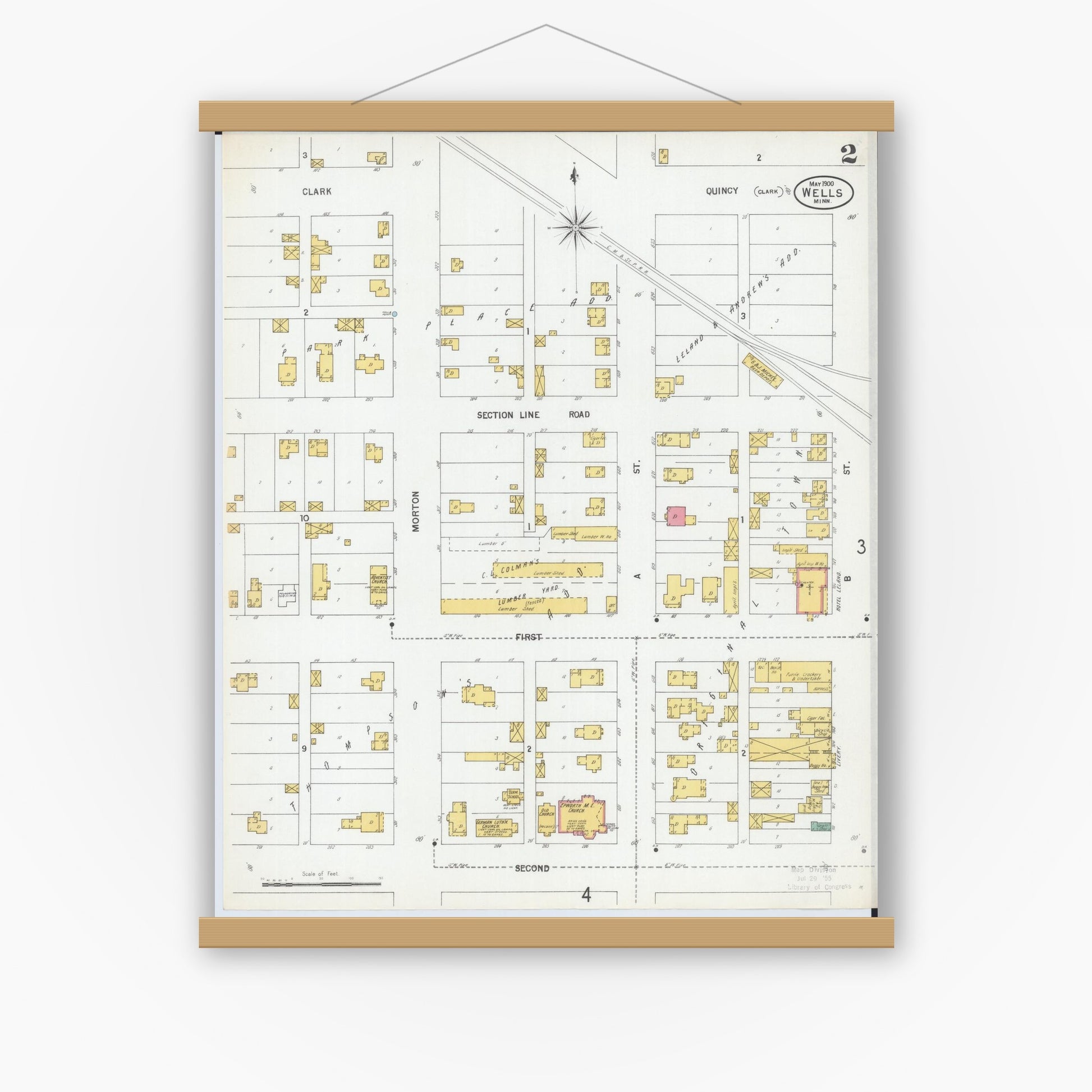 Old map wall art mockup — magnetic wood frame on white wall — Sanborn Fire Insurance Map from Wells, Faribault County, Minnesota (1900), Sheet #0002