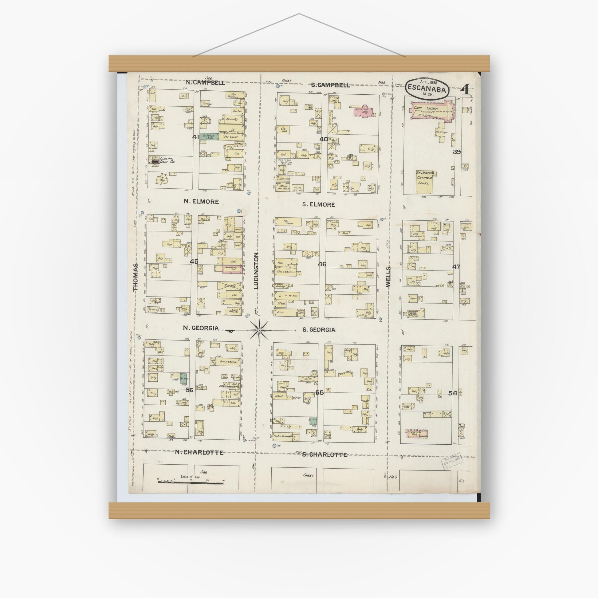 Old map wall art mockup — magnetic wood frame on white wall — Sanborn Fire Insurance Map from Escanaba, Delta County, Michigan (1888), Sheet #0004