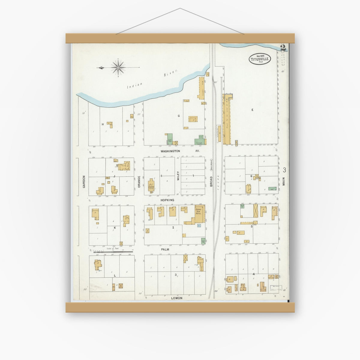 Old map wall art mockup — magnetic wood frame on white wall — Sanborn Fire Insurance Map from Titusville, Brevard County, Florida (1899), Sheet #0002