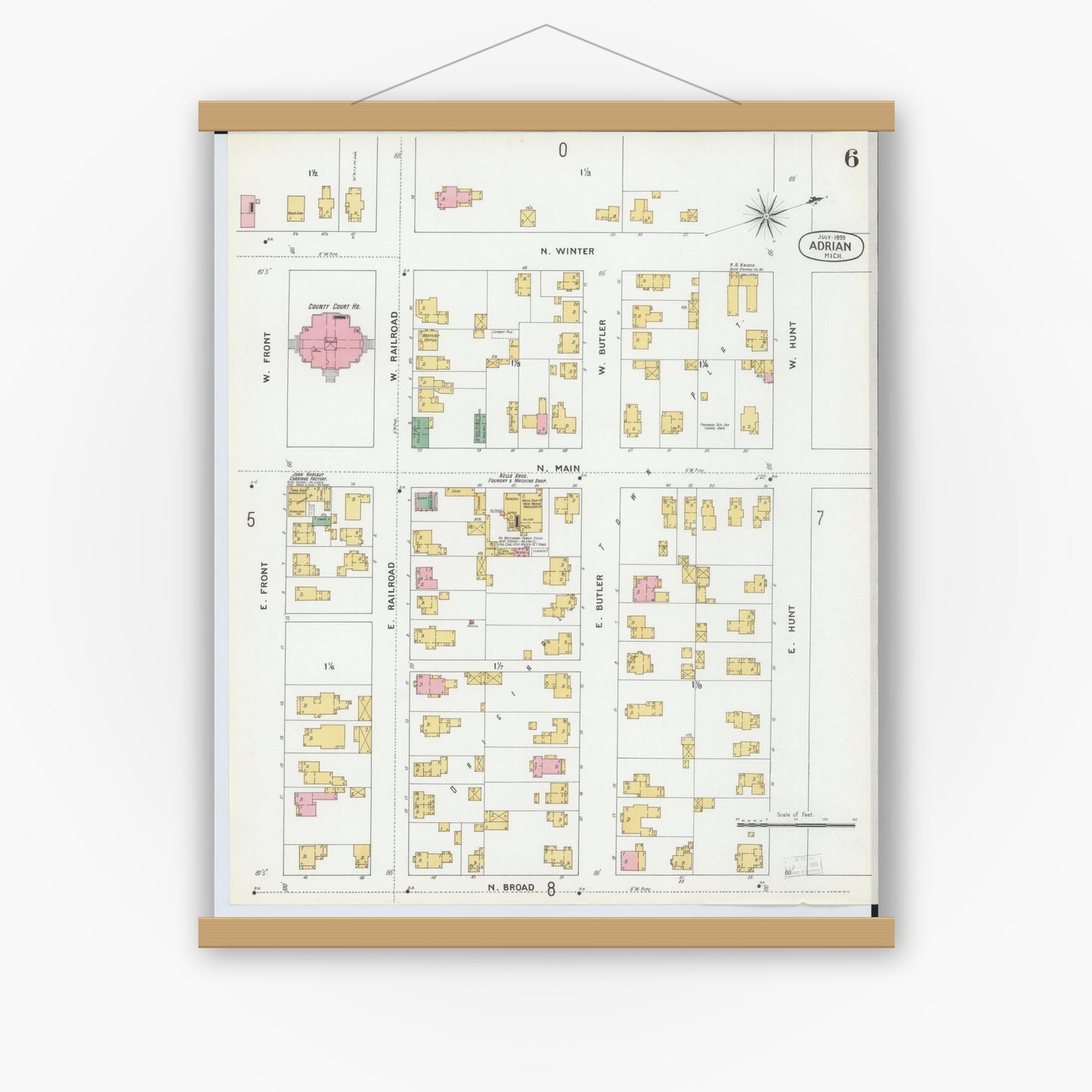 Old map wall art mockup — magnetic wood frame on white wall — Sanborn Fire Insurance Map from Adrian, Lenawee County, Michigan (1899), Sheet #0006