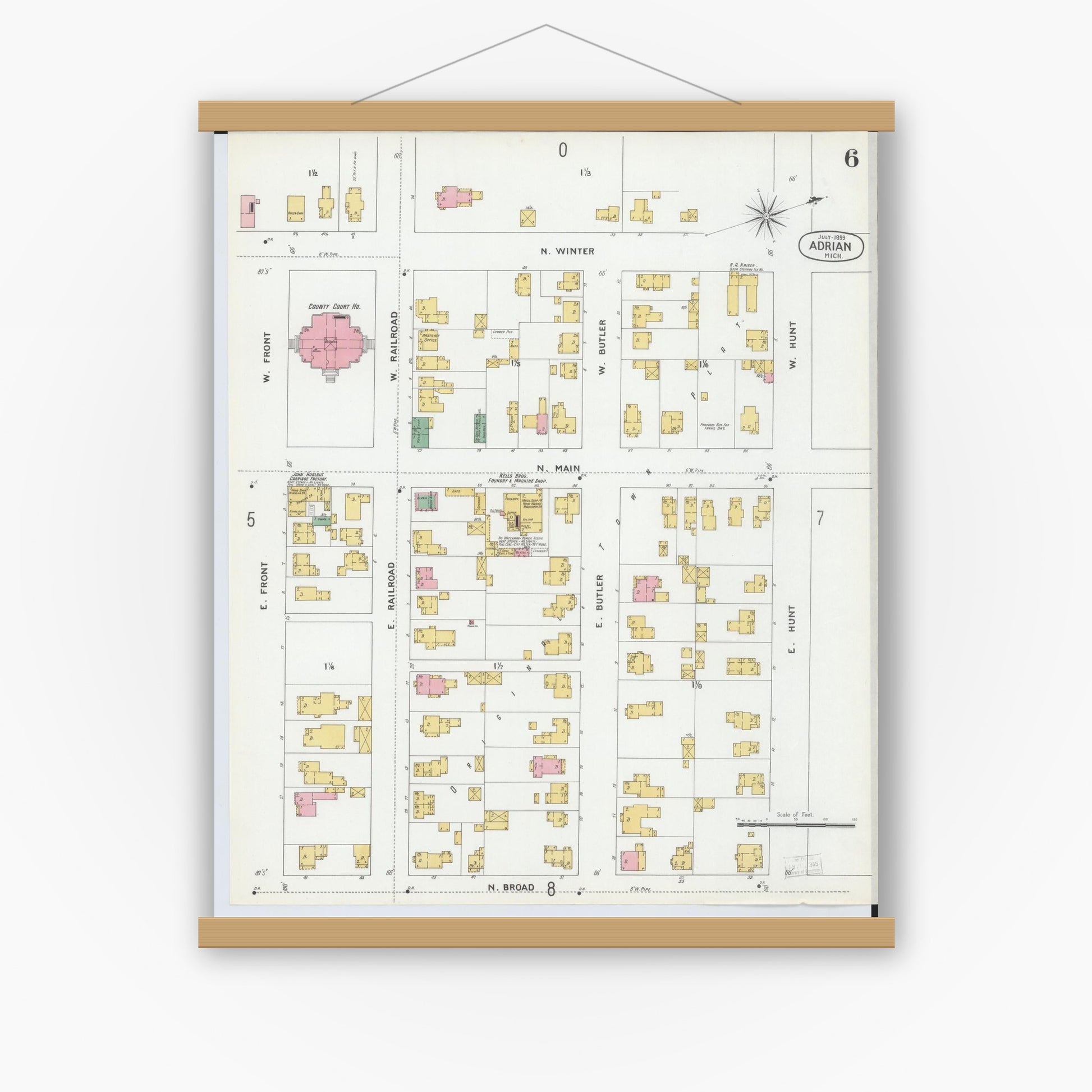 Old map wall art mockup — magnetic wood frame on white wall — Sanborn Fire Insurance Map from Adrian, Lenawee County, Michigan (1899), Sheet #0006