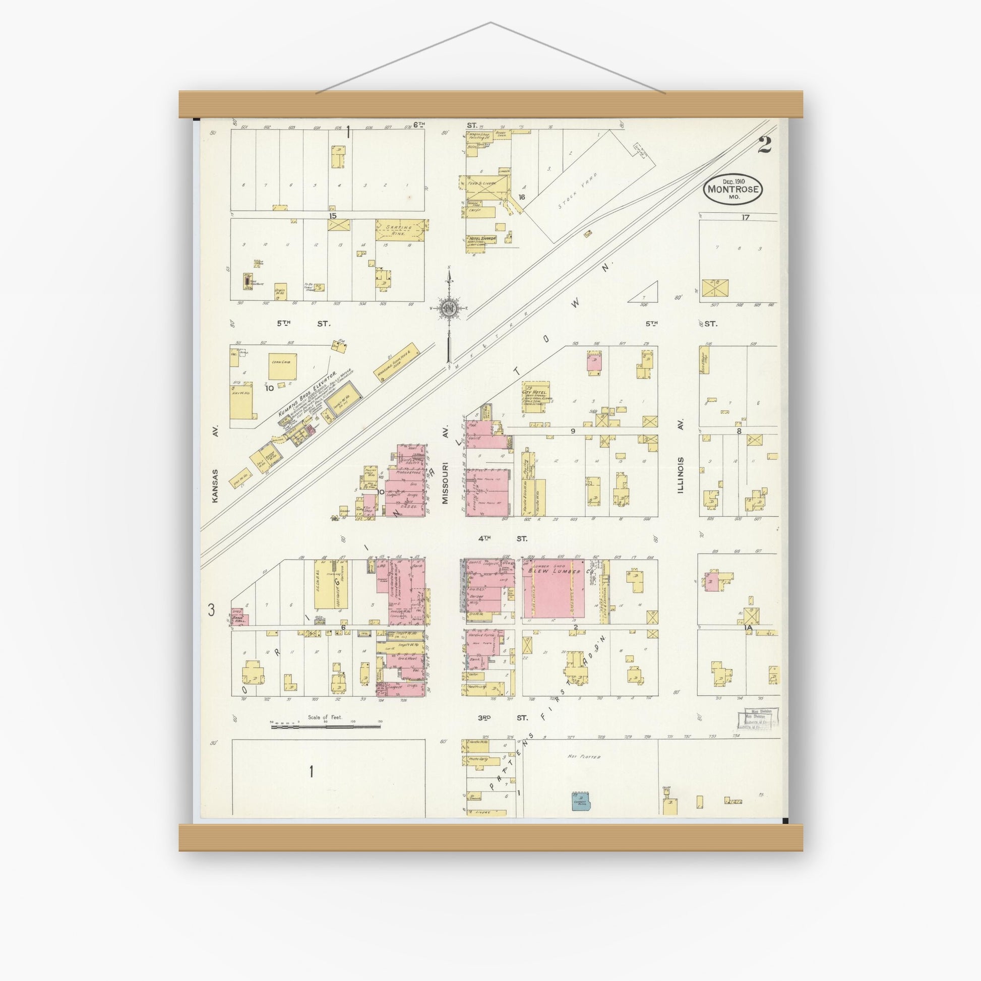 Old map wall art mockup — magnetic wood frame on white wall — Sanborn Fire Insurance Map from Montrose, Henry County, Missouri (1910), Sheet #0002