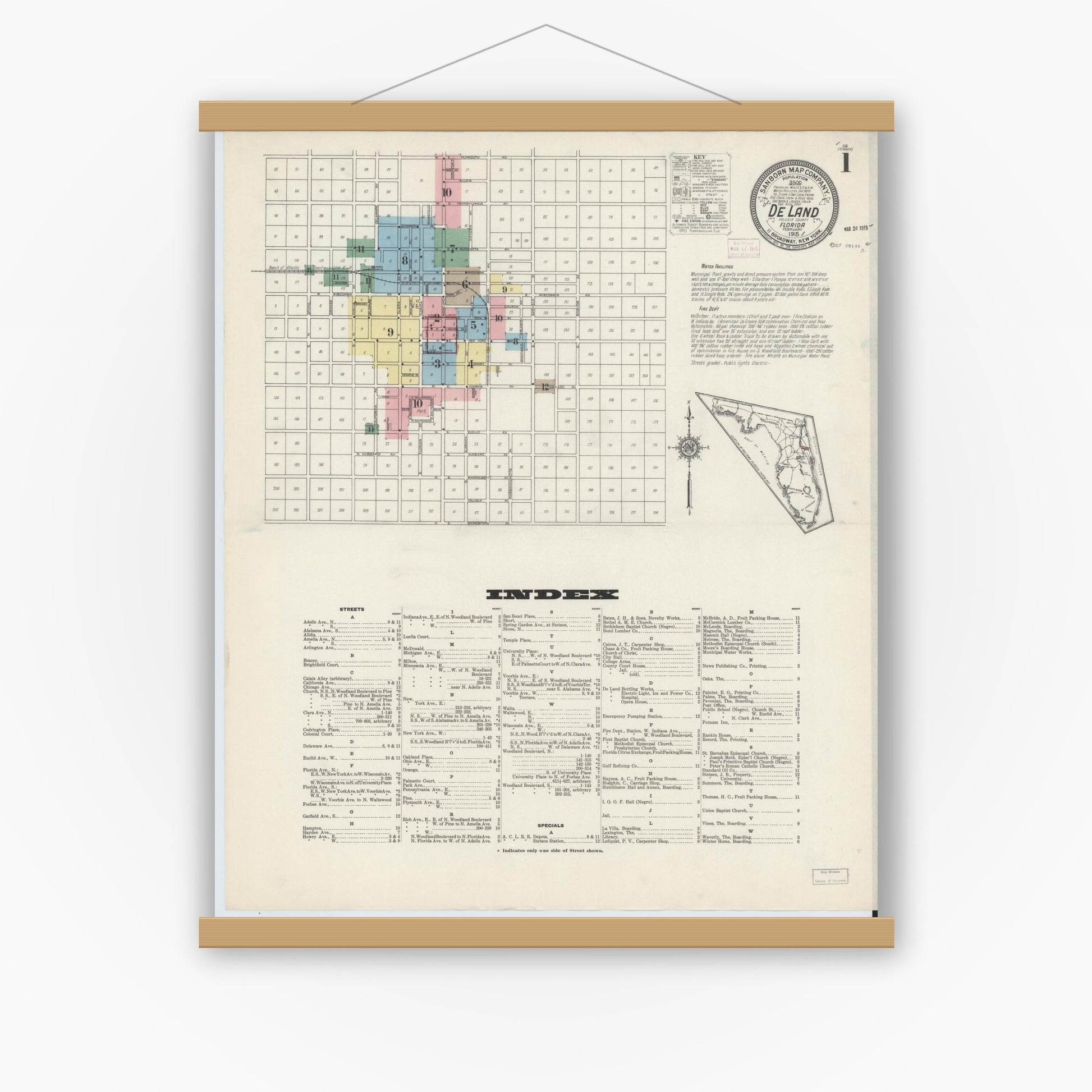 Old map wall art mockup — magnetic wood frame on white wall — Sanborn Fire Insurance Map from De Land, Volusia County, Florida (1915) - Complete Map Set