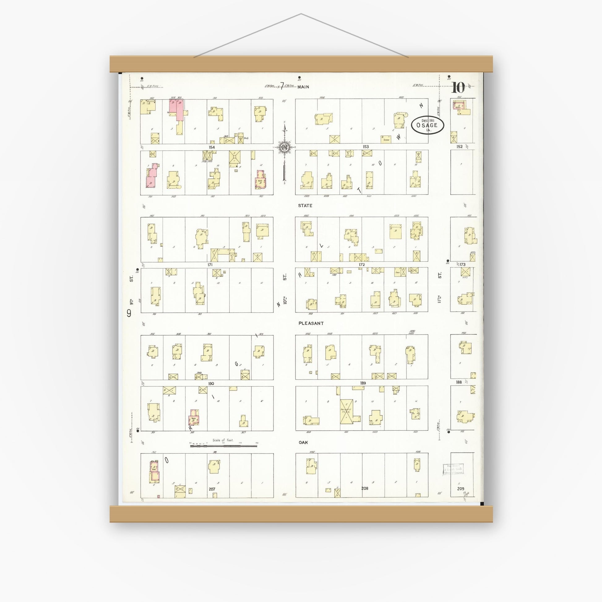 Old map wall art mockup — magnetic wood frame on white wall — Sanborn Fire Insurance Map from Osage, Mitchell County, Iowa (1911), Sheet #0010