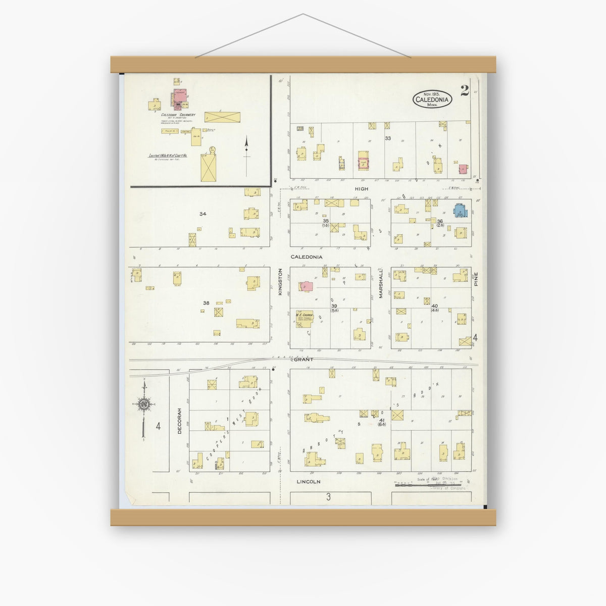 Old map wall art mockup — magnetic wood frame on white wall — Sanborn Fire Insurance Map from Caledonia, Houston County, Minnesota (1915), Sheet #0002