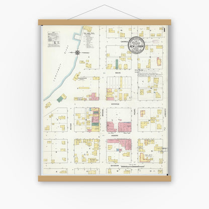 Old map wall art mockup — magnetic wood frame on white wall — Sanborn Fire Insurance Map from New Lisbon, Juneau County, Wisconsin (1909) - Complete Map Set