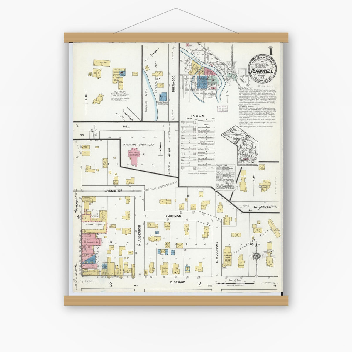 Old map wall art mockup — magnetic wood frame on white wall — Sanborn Fire Insurance Map from Plainwell, Allegan County, Michigan (1918), Sheet #0001