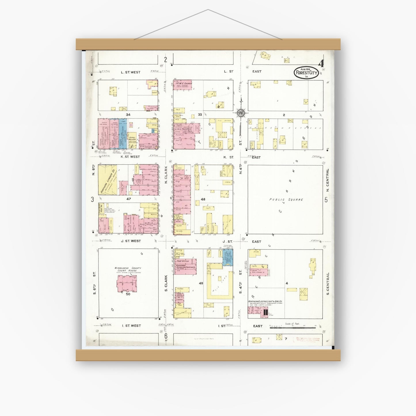 Old map wall art mockup — magnetic wood frame on white wall — Sanborn Fire Insurance Map from Forest City, Winnebago County, Iowa (1916), Sheet #0004