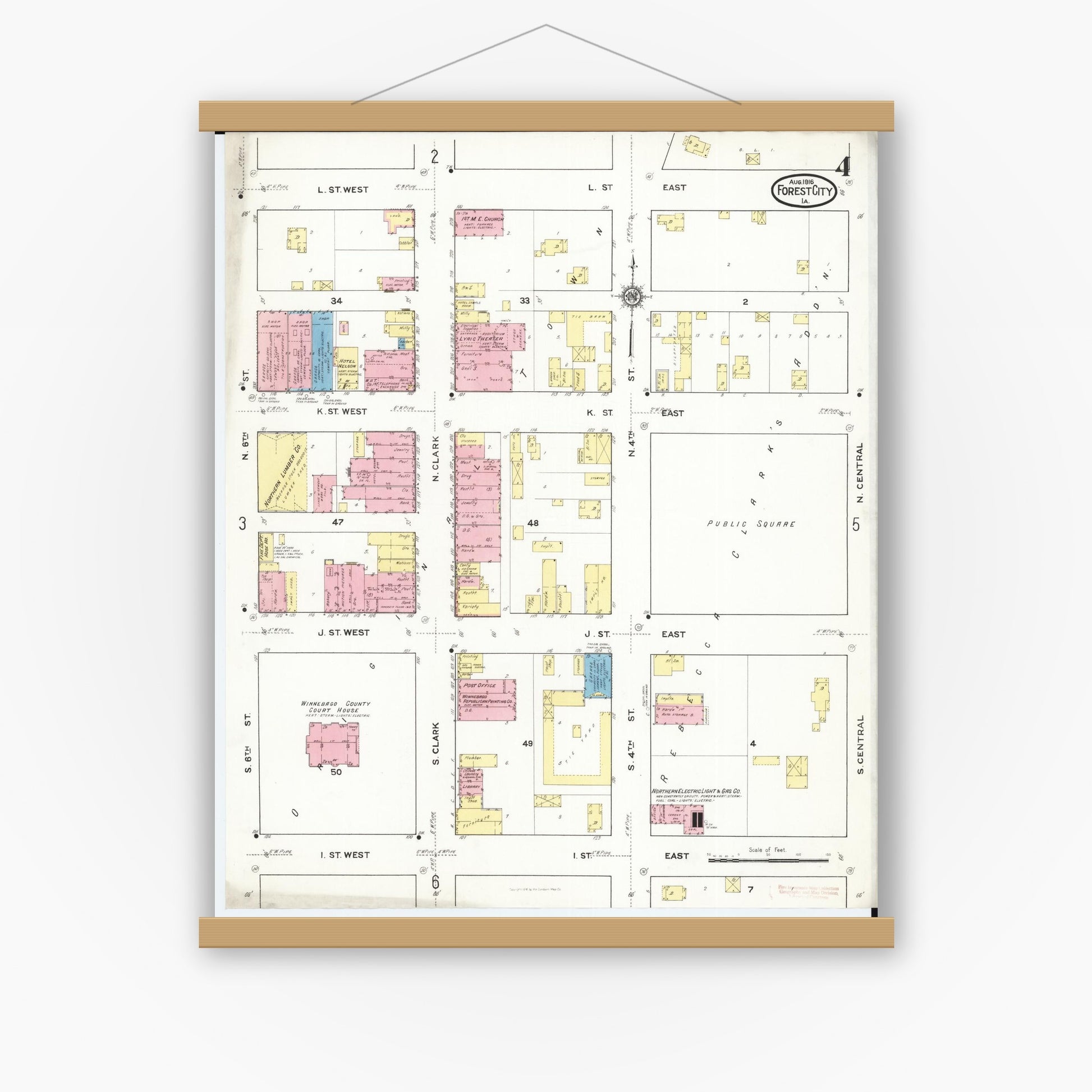 Old map wall art mockup — magnetic wood frame on white wall — Sanborn Fire Insurance Map from Forest City, Winnebago County, Iowa (1916), Sheet #0004