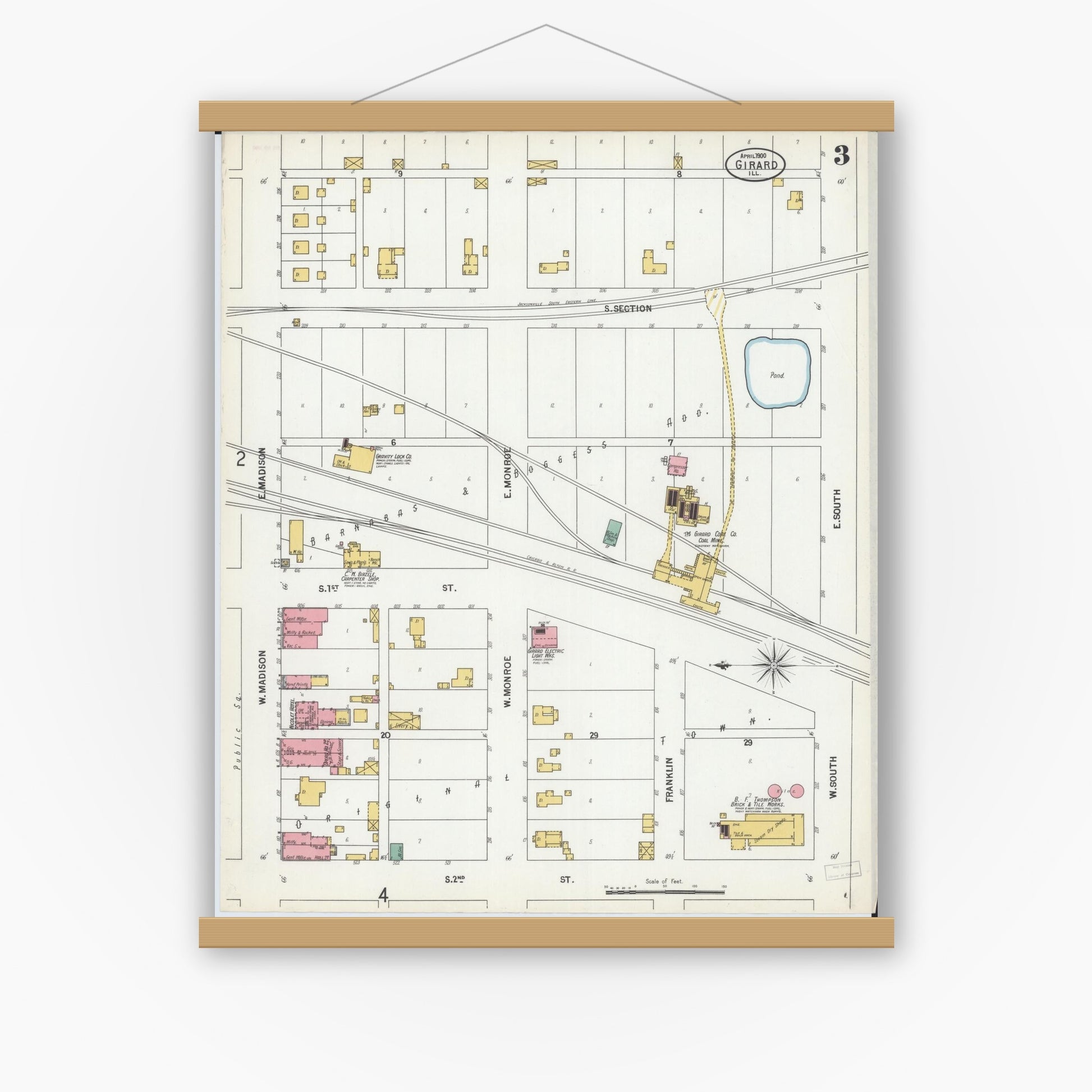 Old map wall art mockup — magnetic wood frame on white wall — Sanborn Fire Insurance Map from Girard, Macoupin County, Illinois (1900), Sheet #0003