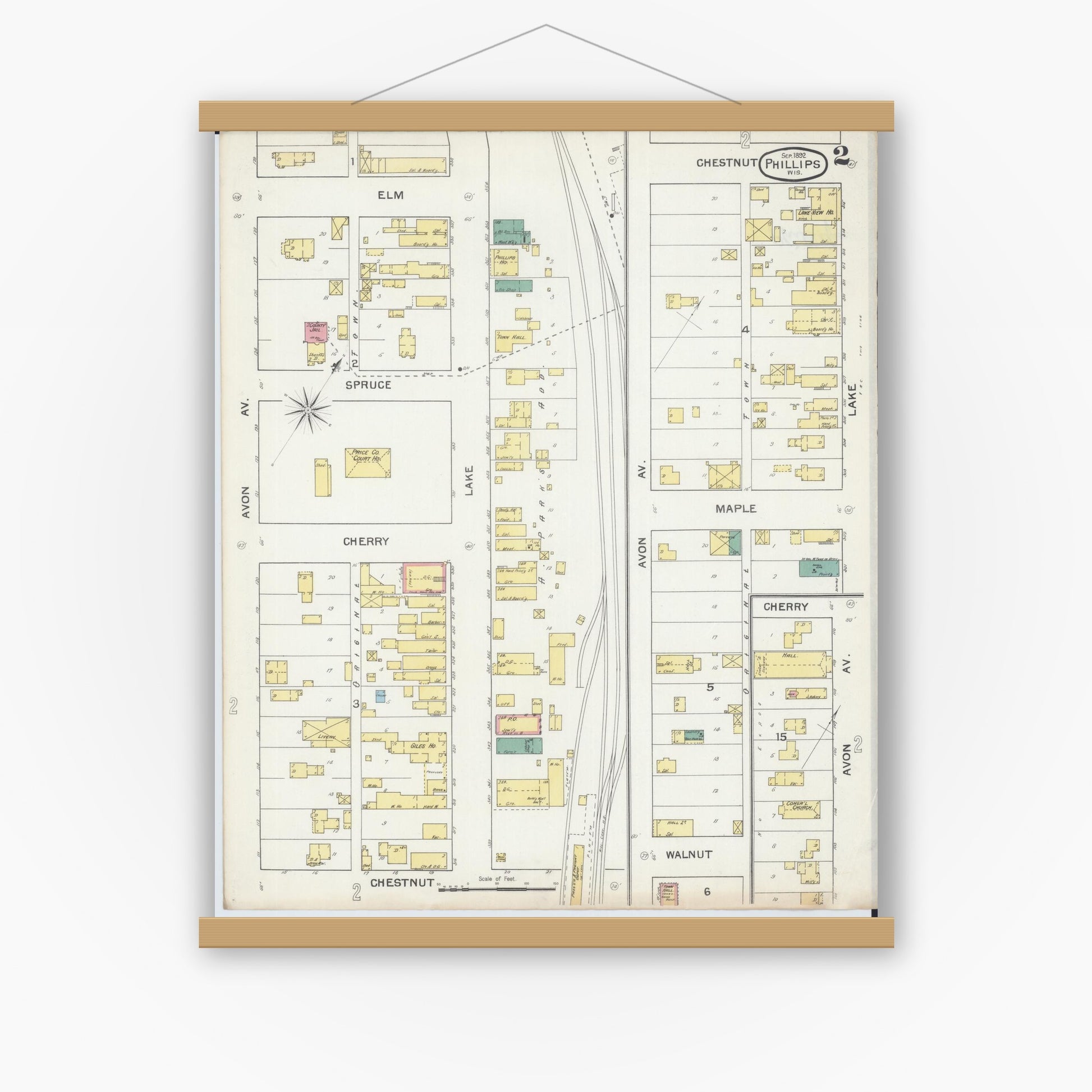 Old map wall art mockup — magnetic wood frame on white wall — Sanborn Fire Insurance Map from Phillips, Price County, Wisconsin (1892), Sheet #0002