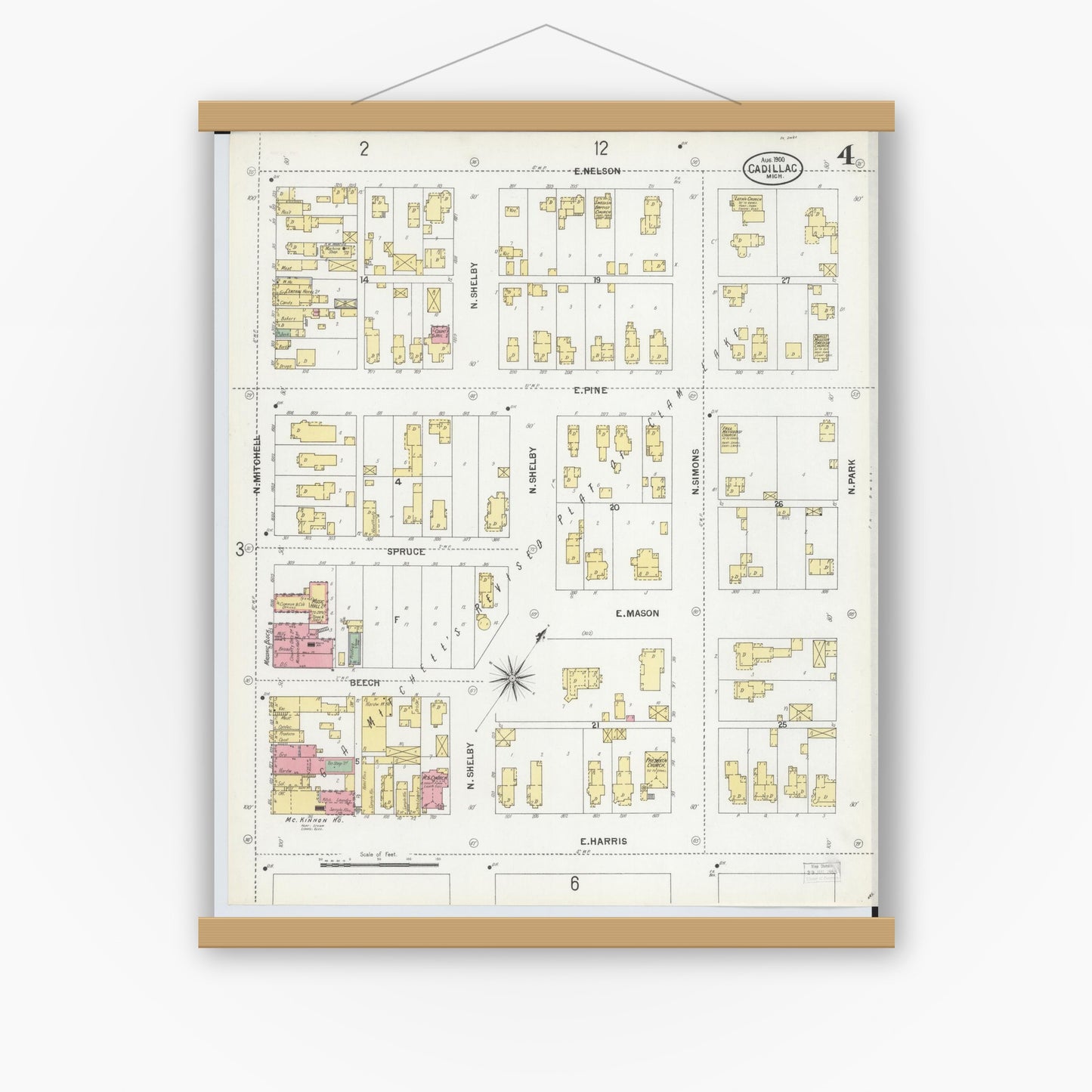 Old map wall art mockup — magnetic wood frame on white wall — Sanborn Fire Insurance Map from Cadillac, Wexford County, Michigan (1900), Sheet #0004