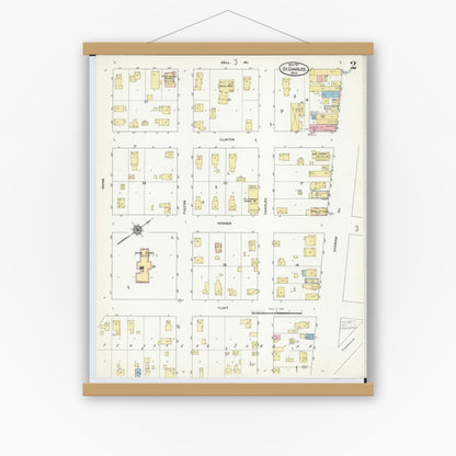 Old map wall art mockup — magnetic wood frame on white wall — Sanborn Fire Insurance Map from Saint Charles, Saginaw County, Michigan (1911), Sheet #0002