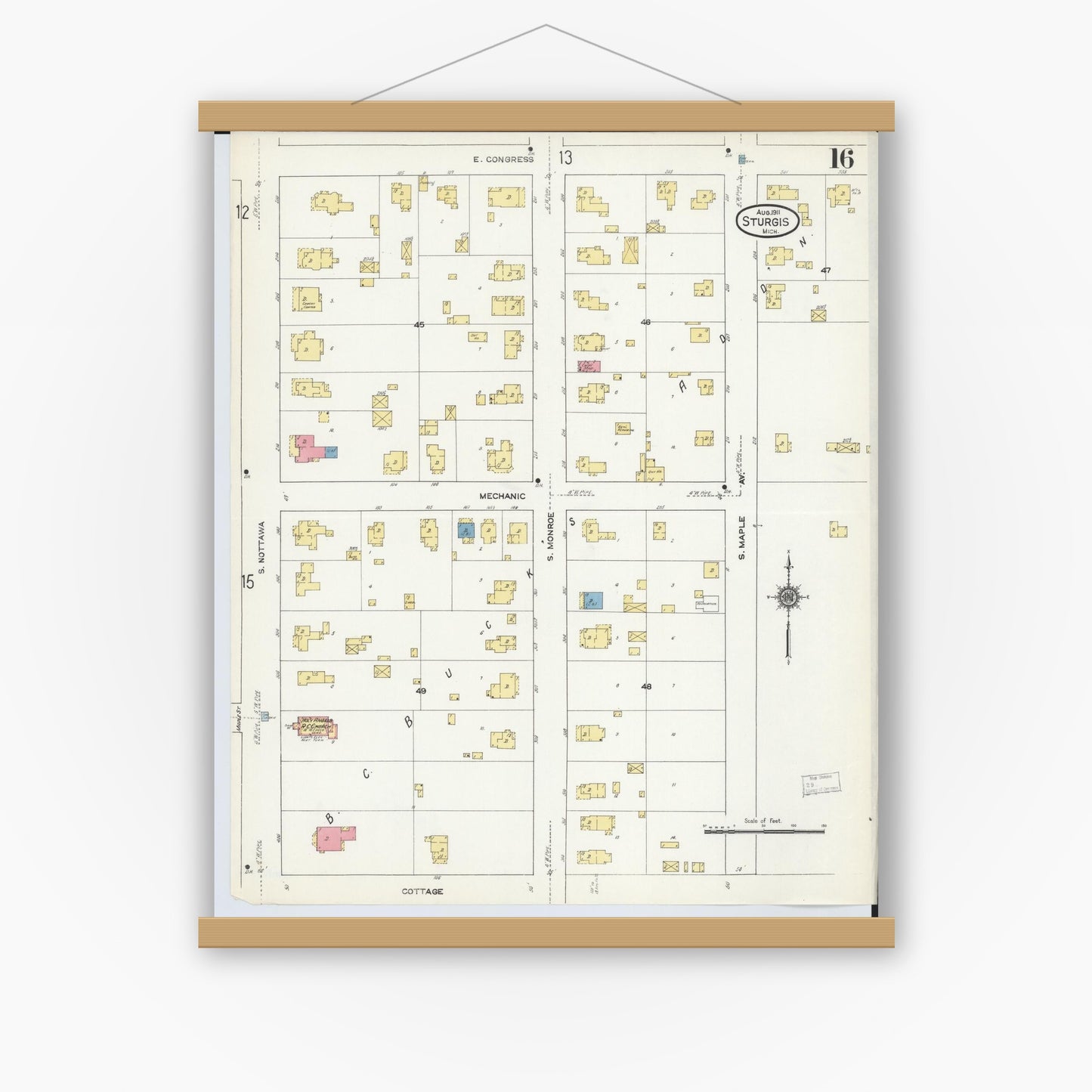 Old map wall art mockup — magnetic wood frame on white wall — Sanborn Fire Insurance Map from Sturgis, Saint Joseph County, Michigan (1911), Sheet #0016