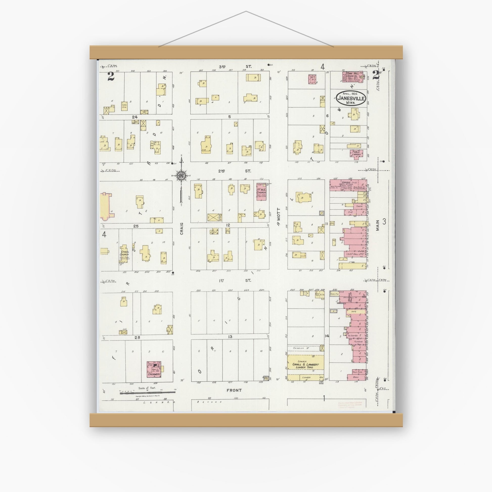 Old map wall art mockup — magnetic wood frame on white wall — Sanborn Fire Insurance Map from Janesville, Waseca County, Minnesota (1924), Sheet #0002