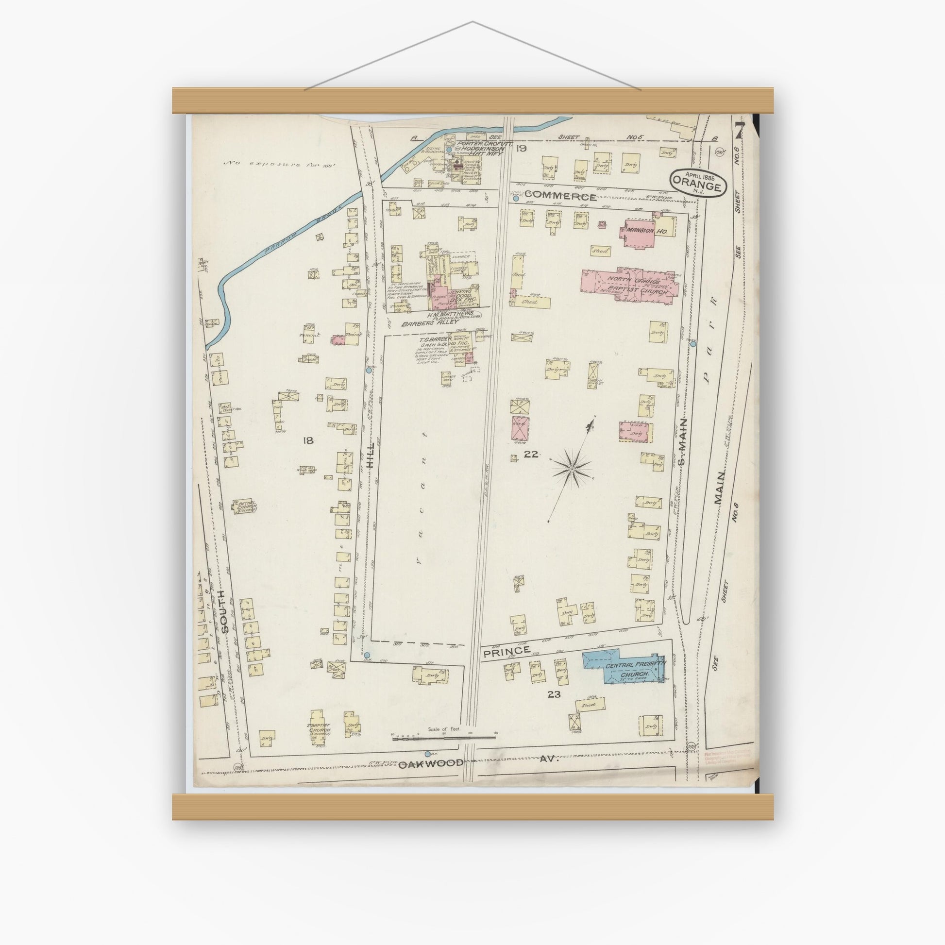 Old map wall art mockup — magnetic wood frame on white wall — Sanborn Fire Insurance Map from Orange, Essex County, New Jersey (1885), Sheet #0007