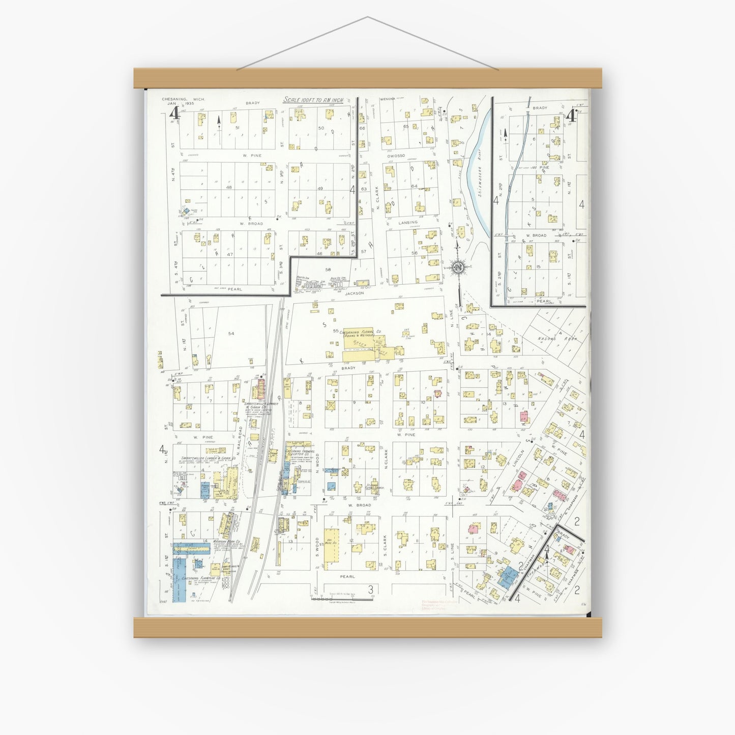 Old map wall art mockup — magnetic wood frame on white wall — Sanborn Fire Insurance Map from Chesaning, Saginaw County, Michigan (1935), Sheet #0004