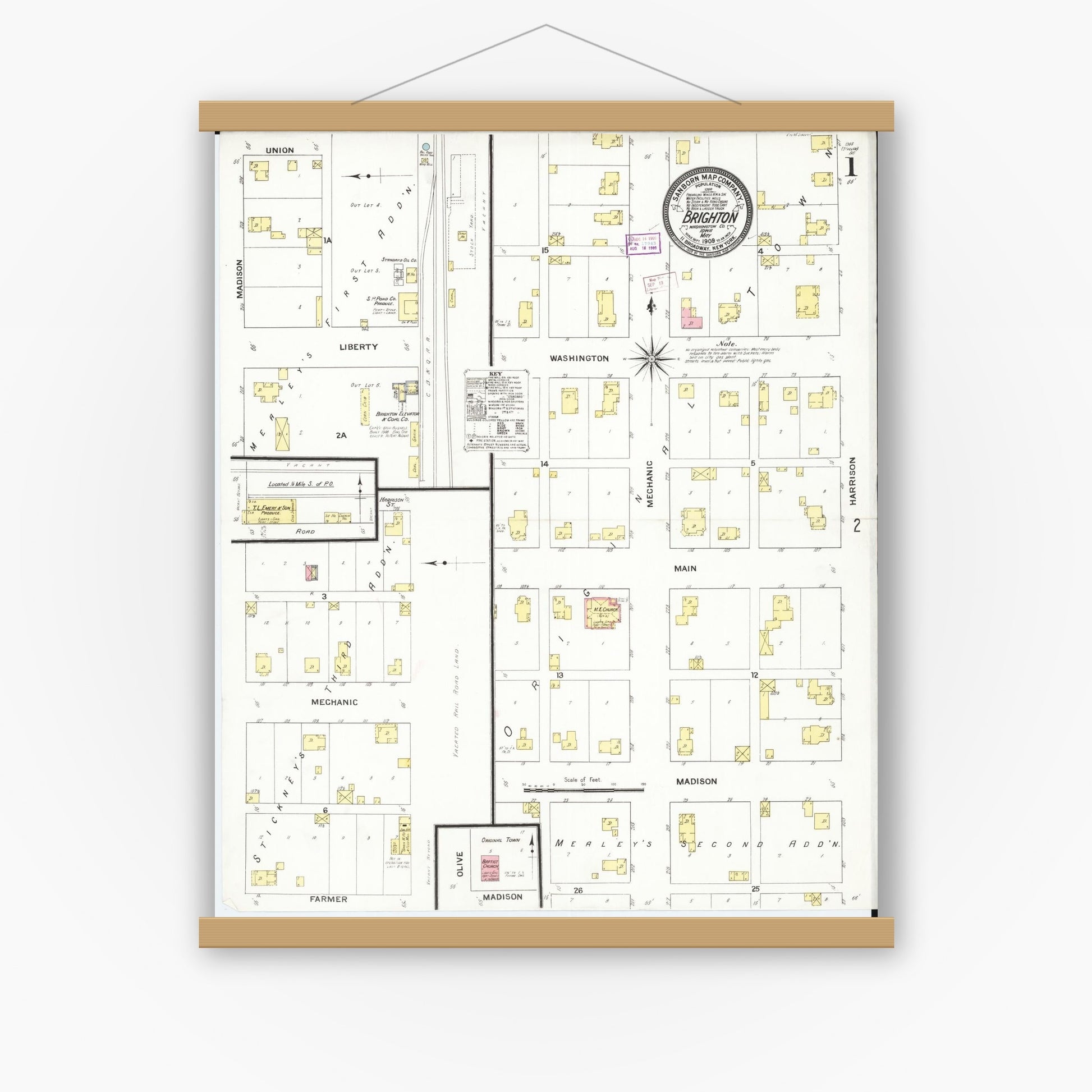 Old map wall art mockup — magnetic wood frame on white wall — Sanborn Fire Insurance Map from Brighton, Washington County, Iowa (1909) â€” Complete Set